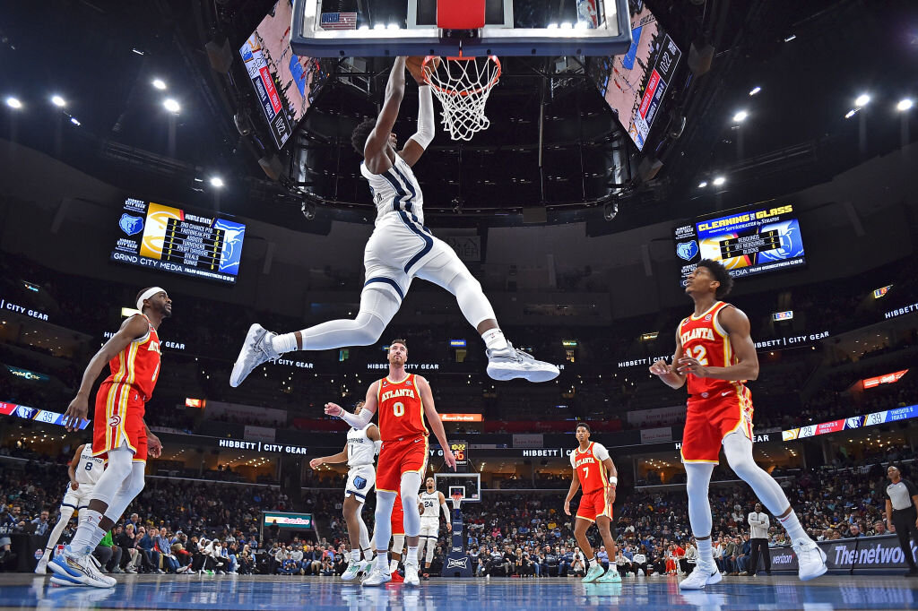 MEMPHIS, TENNESSEE - DECEMBER 12: Jaren Jackson Jr. #13 of the Memphis Grizzlies goes to the basket during the first half against the Atlanta Hawks at FedExForum on December 12, 2022 in Memphis, Tennessee. NOTE TO USER: User expressly acknowledges and agrees that, by downloading and or using this photograph, User is consenting to the terms and conditions of the Getty Images License Agreement. (Photo by Justin Ford/Getty Images)