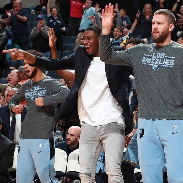 Jaren Jackson Jr. cheers from bench