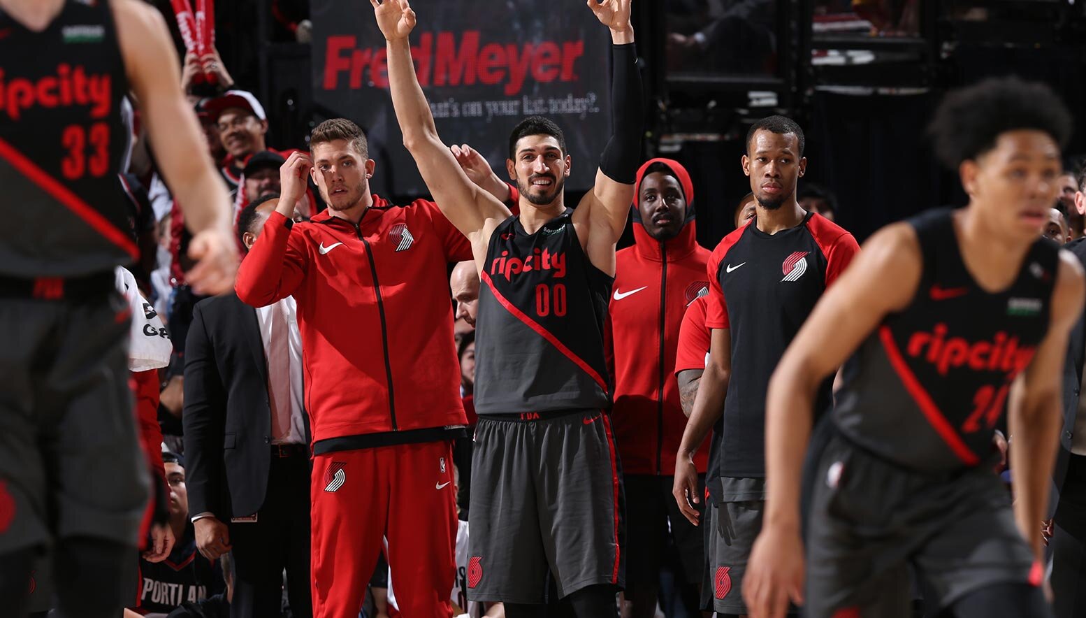 Portland Trail Blazers bench reacts to a play
