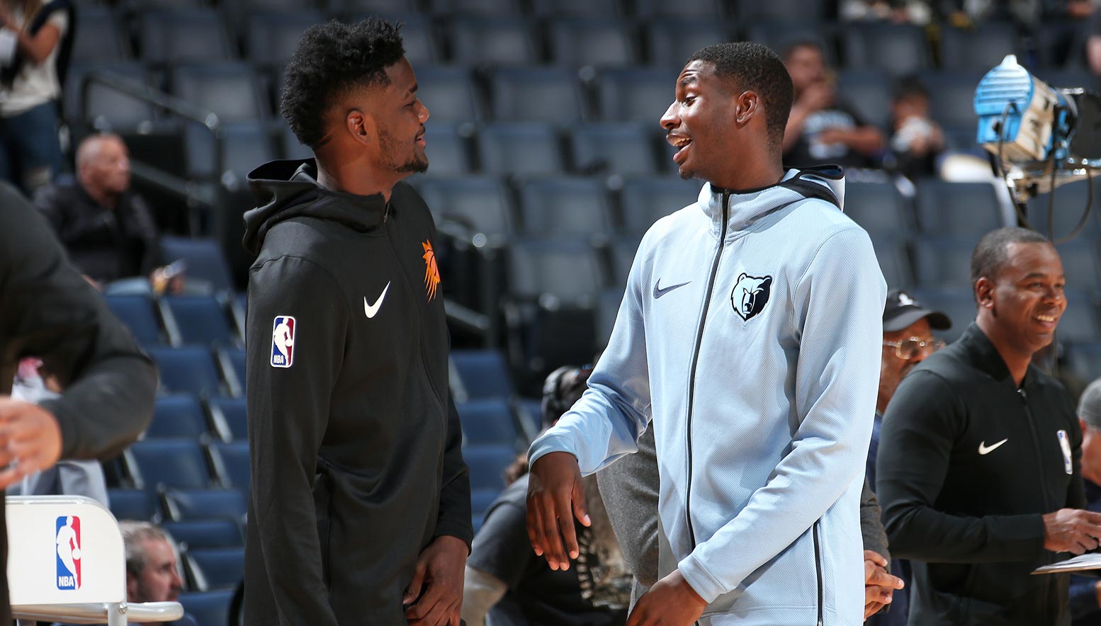 Deandre Ayton #22 of the Phoenix Suns and Jaren Jackson Jr. #13 of the Memphis Grizzlies talk before the game