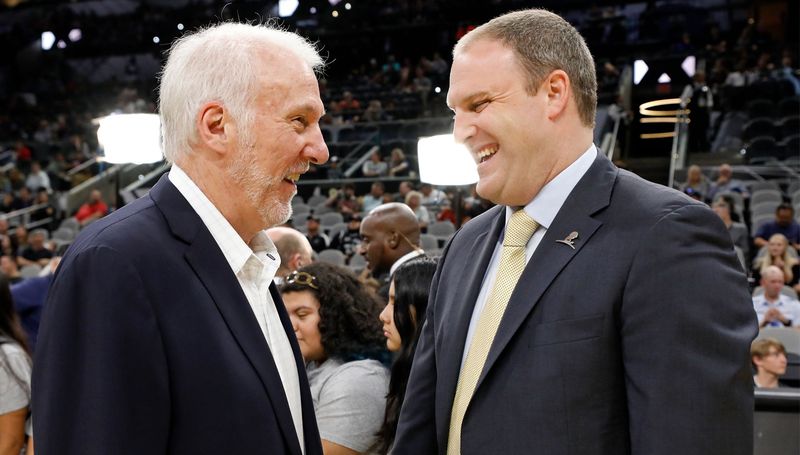 Gregg Popovich and Taylor Jenkins
