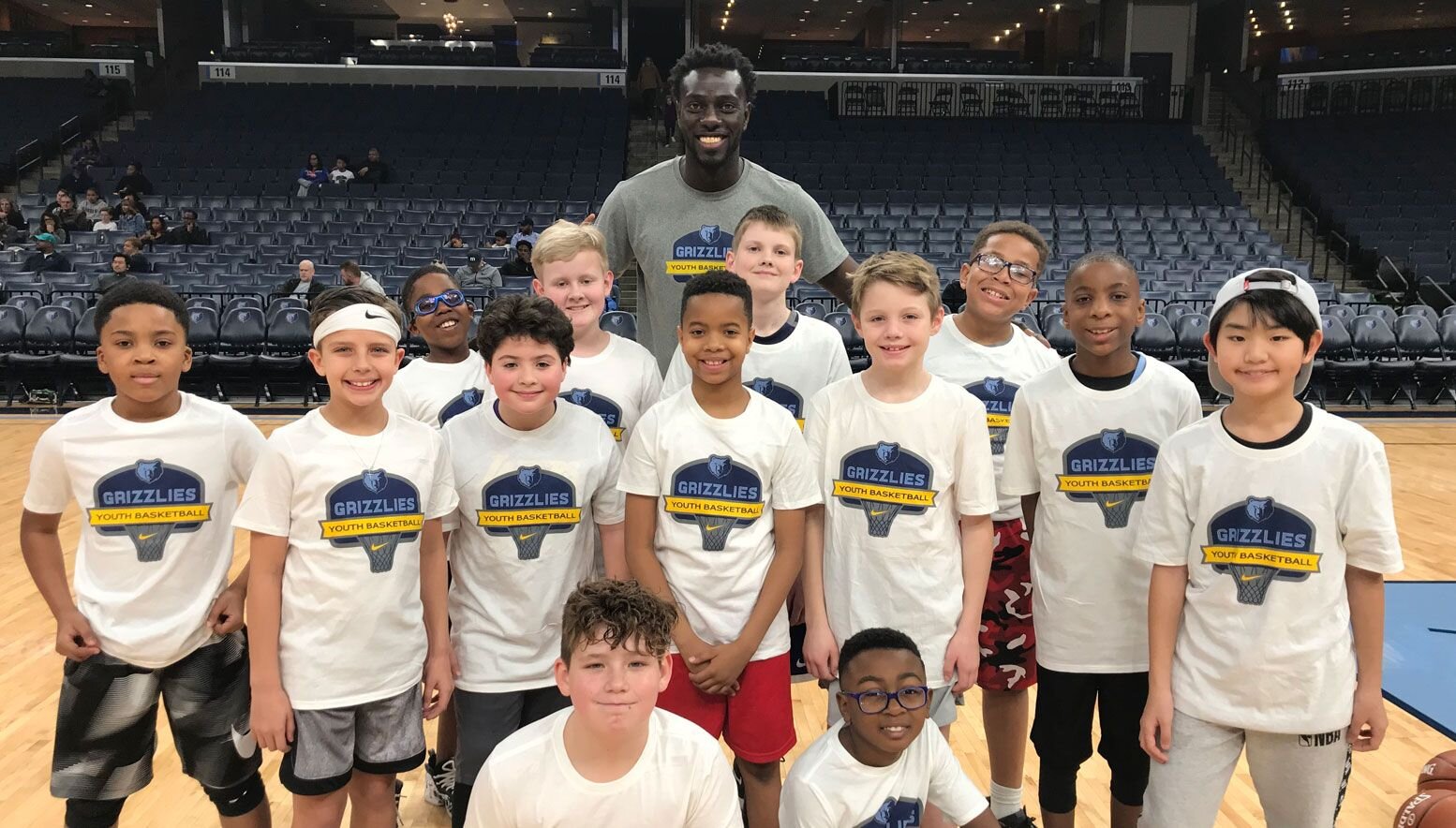 Sidy Sall and kids at a camp