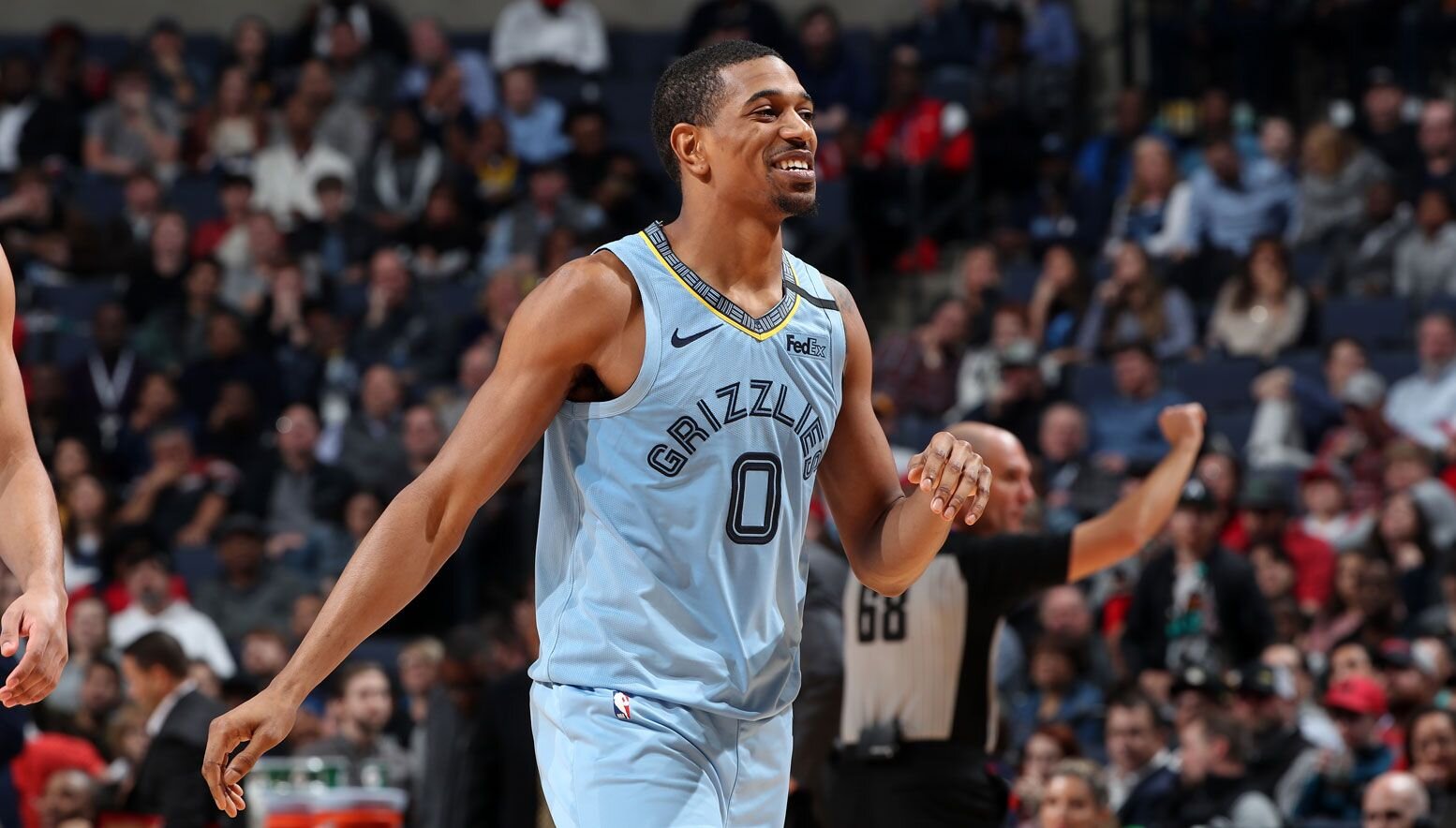 De'Anthony Melton smiling on the court