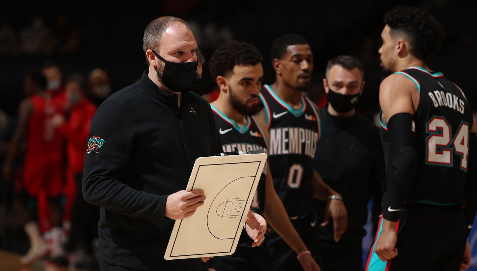 Taylor Jenkins coaching during a timeout