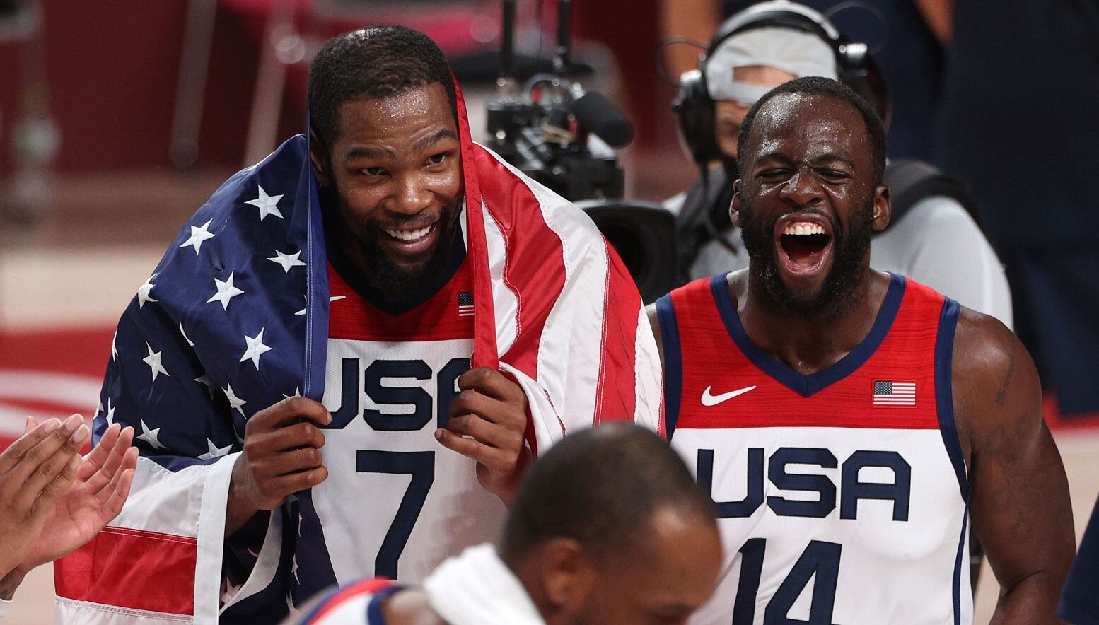 Draymond Green and Kevin Durant celebrating with Team USA