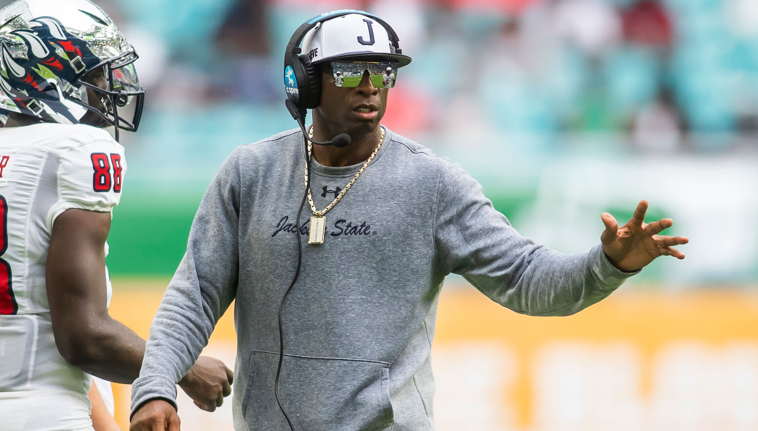 Deion Sanders coaching on the sideline