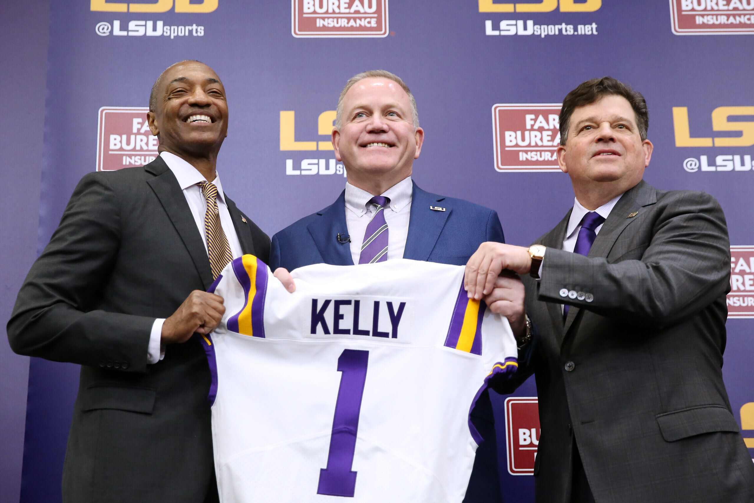 Brian Kelly (center) is introduced as the head football coach of the LSU Tigers