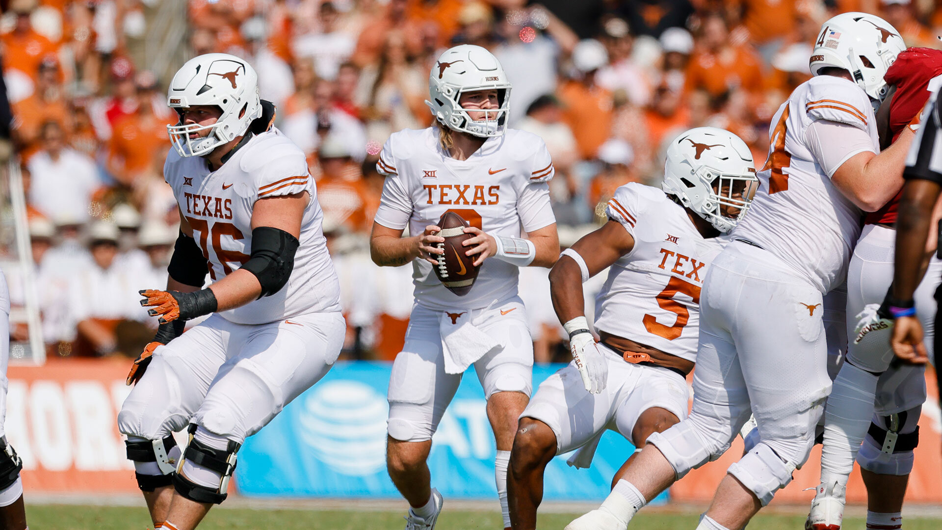 DALLAS, TX - OCTOBER 08: Texas Longhorns quarterback Quinn Ewers (3) looks downfield for an open receiver during the game between the Oklahoma Sooners and the Texas Longhorns on October 8, 2022 at the Cotton Bowl Stadium in Dallas, Texas. Photo by Matthew Pearce/Icon Sportswire via Getty Images