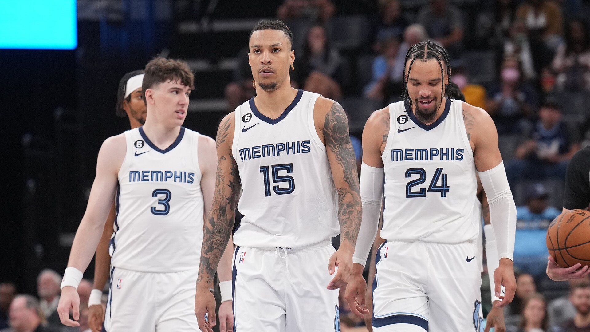 MEMPHIS, TN - OCTOBER 3: Jake LaRavia #3, Brandon Clarke #15 and Dillon Brooks #24 of the Memphis Grizzlies look on during a preseason game on October 3, 2022 at FedExForum in Memphis, Tennessee. Photo by Jesse D. Garrabrant/NBAE via Getty Images