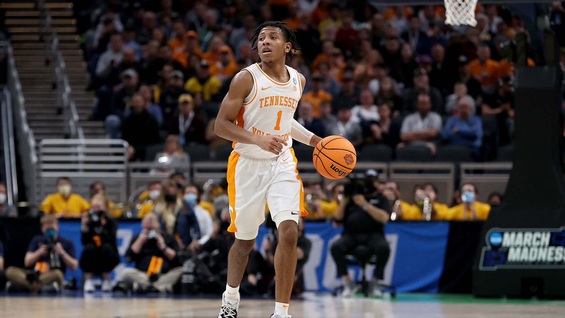 INDIANAPOLIS, INDIANA - MARCH 19: Kennedy Chandler #1 of the Tennessee Volunteers dribbles the ball during the game against the Michigan Wolverines during the second round of the 2022 NCAA Men's Basketball Tournament at Gainbridge Fieldhouse on March 19, 2022 in Indianapolis, Indiana. Photo by Dylan Buell/Getty Images