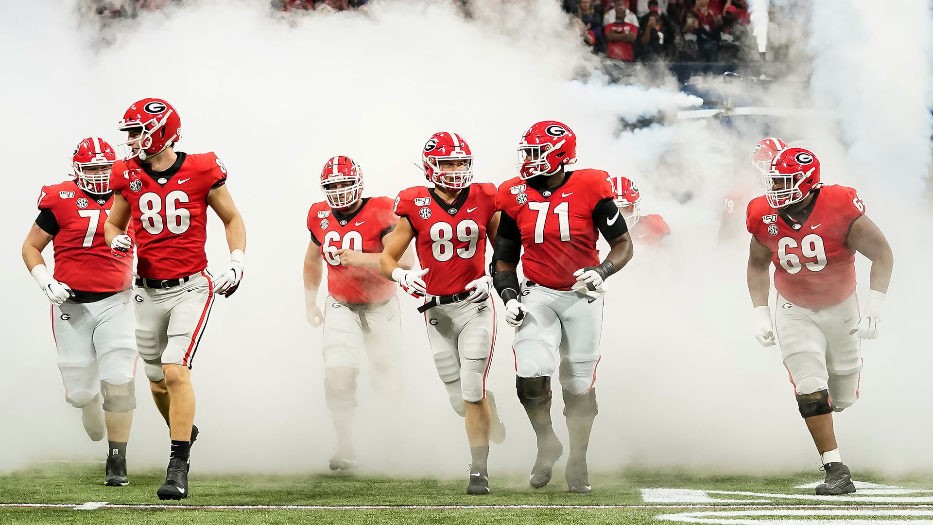 ATLANTA, GA - DECEMBER 07: Georgia Bulldogs take the field during a game between Georgia Bulldogs and LSU Tigers at Mercedes Benz Stadium on December 7, 2019 in Atlanta, Georgia. (Photo by Steve Limentani/ISI Photos/Getty Images)