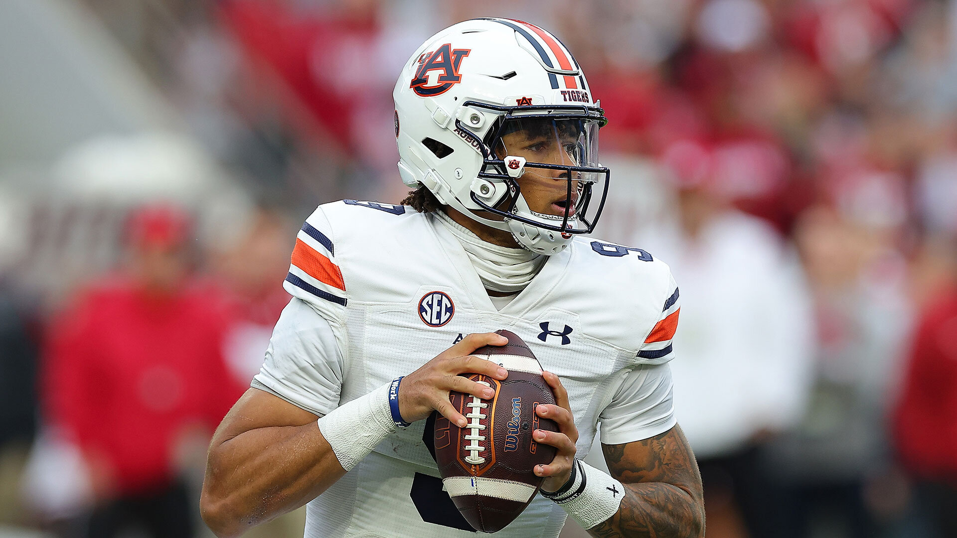 TUSCALOOSA, ALABAMA - NOVEMBER 26:  Robby Ashford #9 of the Auburn Tigers looks to pass against the Alabama Crimson Tide during the first half at Bryant-Denny Stadium on November 26, 2022 in Tuscaloosa, Alabama. (Photo by Kevin C. Cox/Getty Images)