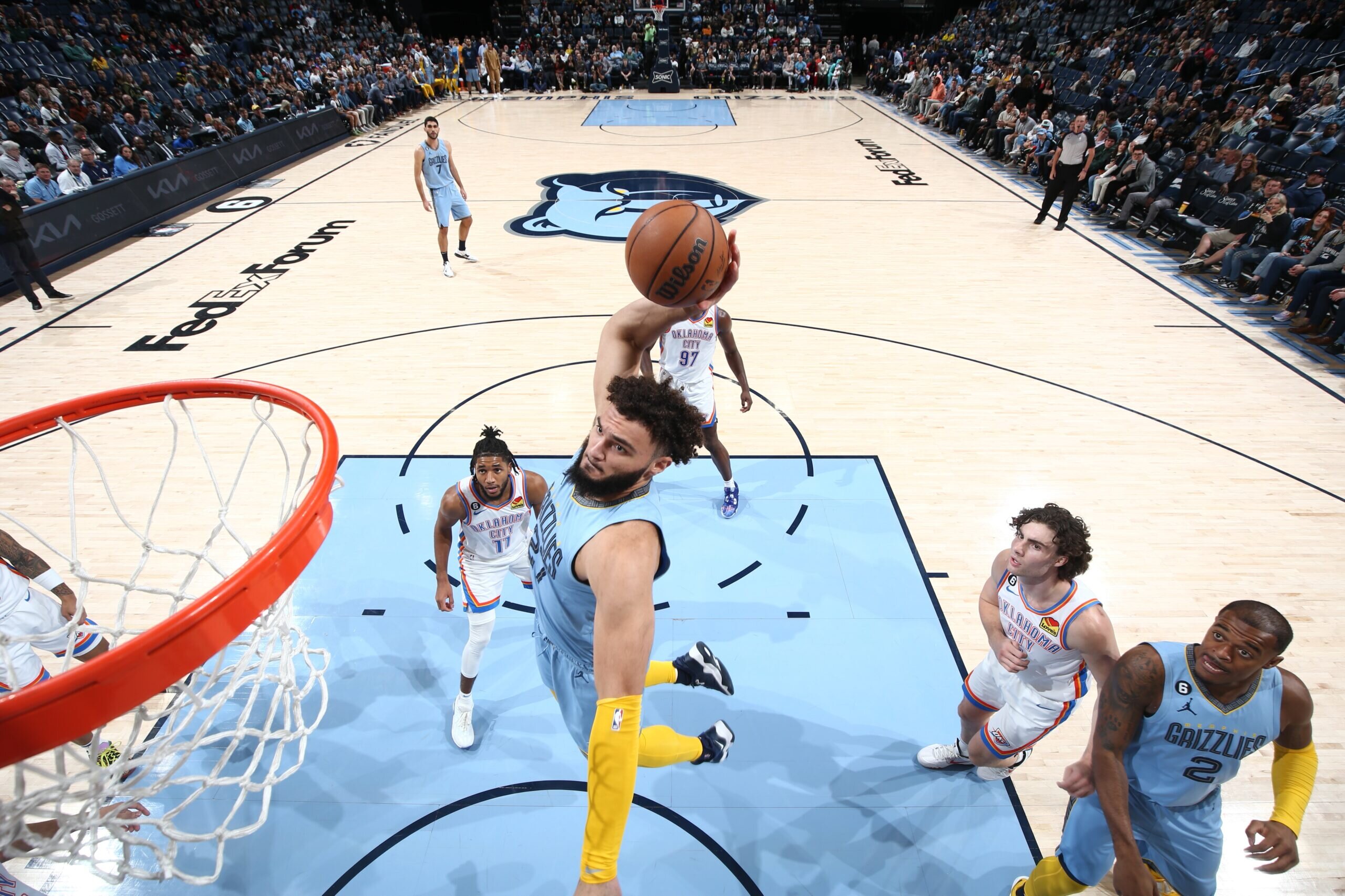 MEMPHIS, TN - DECEMBER 7: David Roddy #27 of the Memphis Grizzlies drives to the basket during the game against the Oklahoma City Thunder on December 7, 2022 at FedExForum in Memphis, Tennessee. Photo by Joe Murphy/NBAE via Getty Images