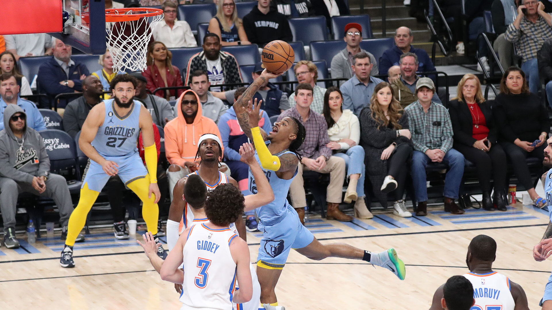 MEMPHIS, TN - DECEMBER 7: Ja Morant #12 of the Memphis Grizzlies drives to the basket during the game against the Oklahoma City Thunder on December 7, 2022 at FedExForum in Memphis, Tennessee. Photo by Joe Murphy/NBAE via Getty Images