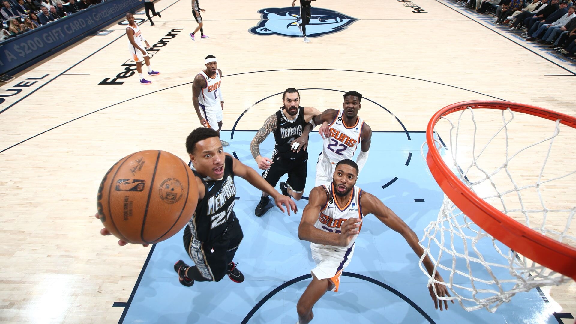 MEMPHIS, TN - DECEMBER 27: Desmond Bane #22 of the Memphis Grizzlies drives to the basket during the game against the Phoenix Suns on December 27, 2022 at FedExForum in Memphis, Tennessee.