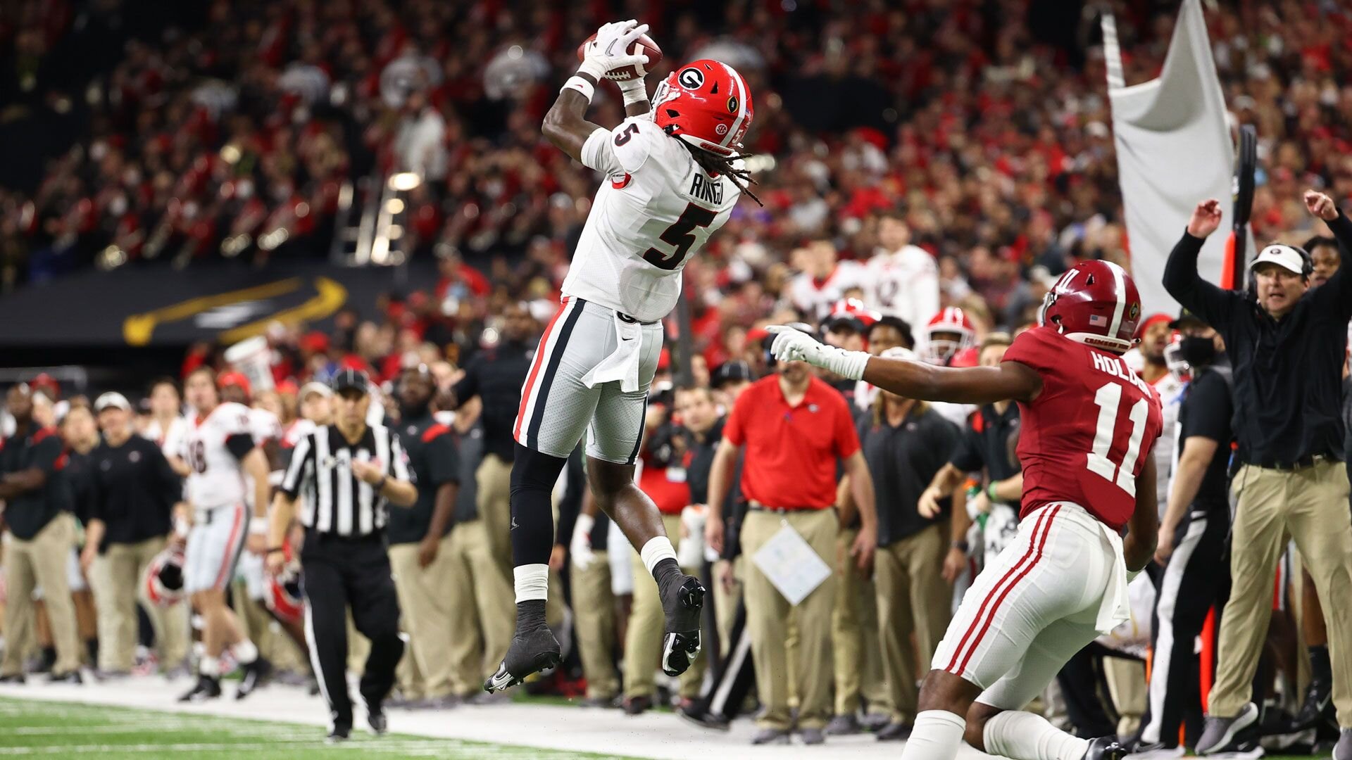 INDIANAPOLIS, IN - JANUARY 10: Kelee Ringo #5 of the Georgia Bulldogs intercepts the ball in the fourth quarter of the College Football Playoff Championship game against the Alabama Crimson Tide held at Lucas Oil Stadium on January 10, 2022 in Indianapolis, Indiana. (Photo by Jamie Schwaberow/Getty Images)