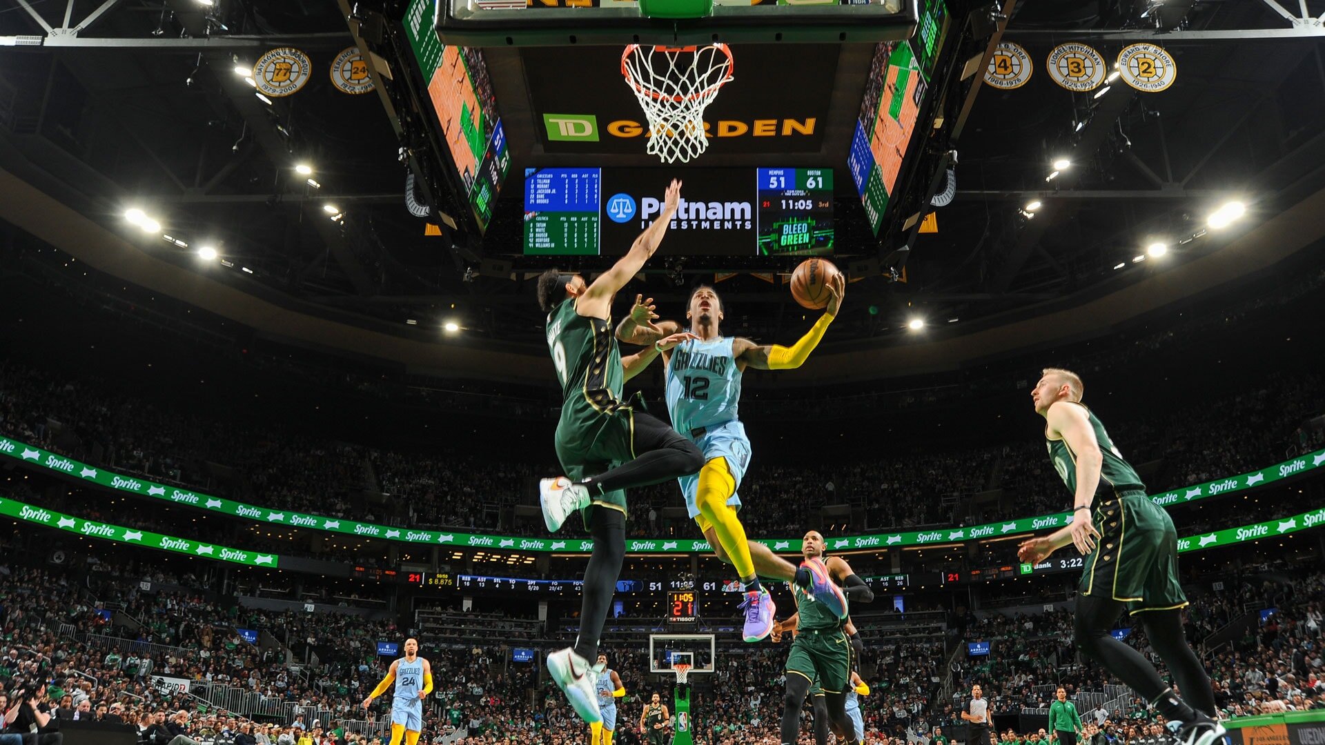 BOSTON, MA - FEBUARY 12: Ja Morant #12 of the Memphis Grizzlies drives to the basket during the game on Febuary 12, 2023 at the TD Garden in Boston, Massachusetts.