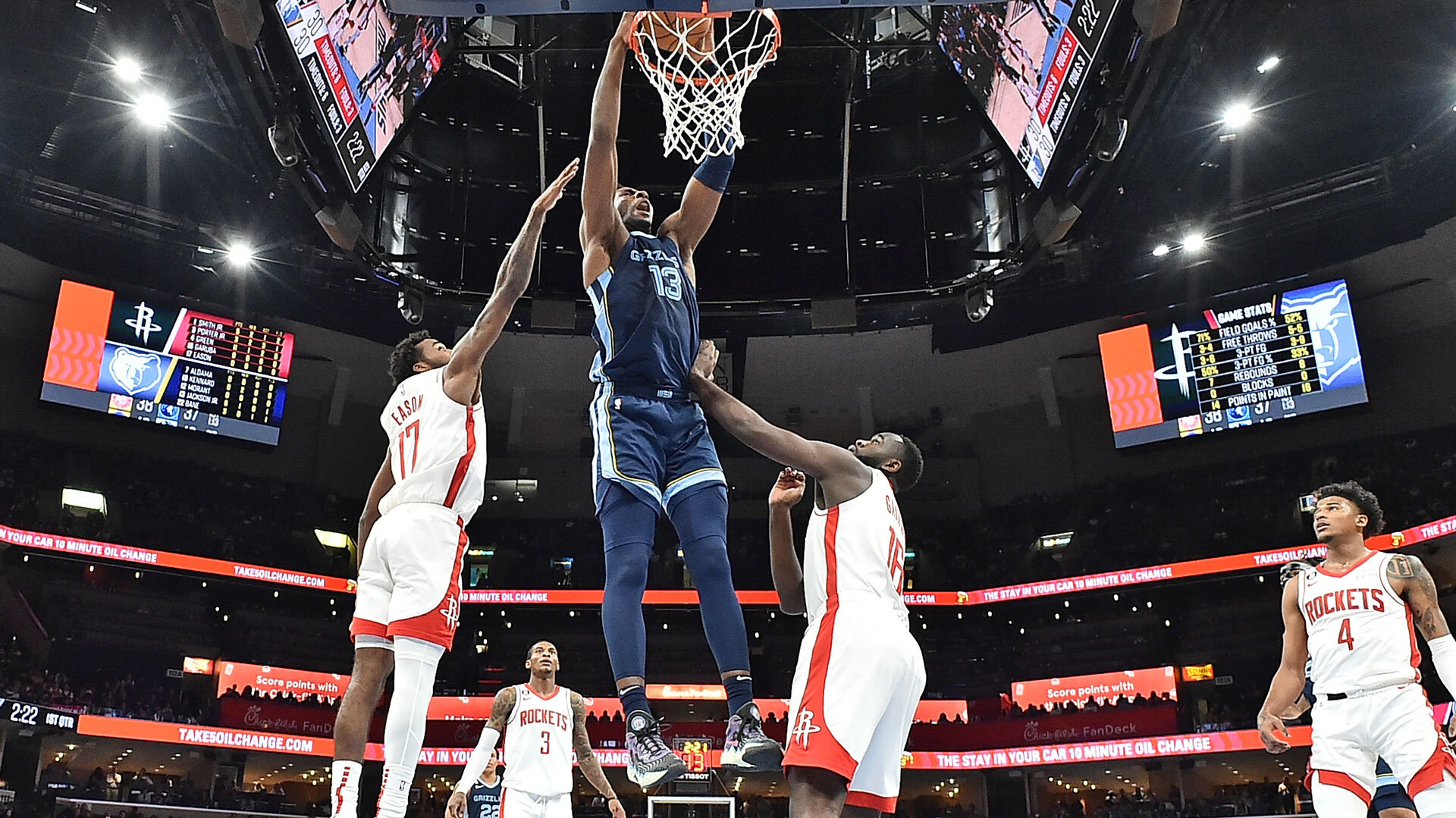 MEMPHIS, TENNESSEE - MARCH 22: Jaren Jackson Jr. #13 of the Memphis Grizzlies dunks during the game against the Houston Rockets at FedExForum on March 22, 2023 in Memphis, Tennessee.