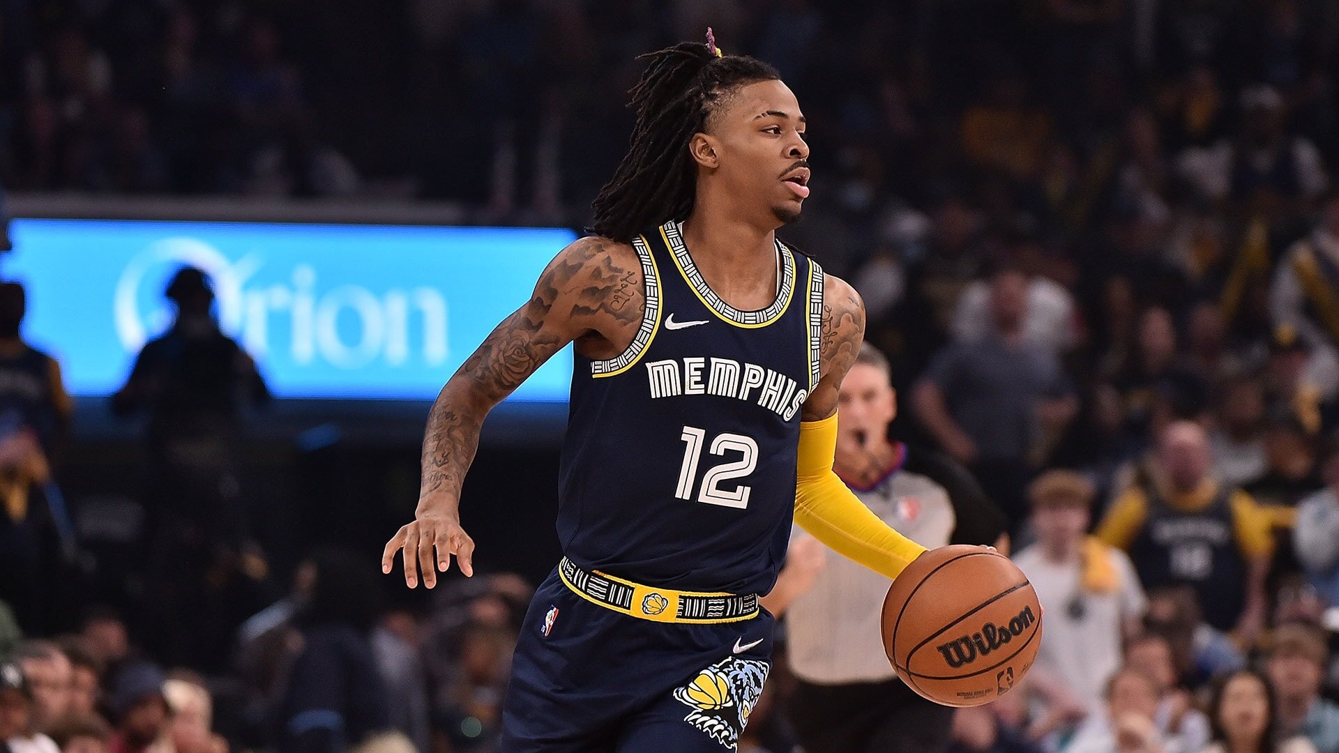 Ja Morant #12 of the Memphis Grizzlies brings the ball up court against the Golden State Warriors during Game Two of the Western Conference Semifinals of the NBA Playoffs at FedExForum on May 03, 2022 in Memphis, Tennessee. Photo by Justin Ford/Getty Images