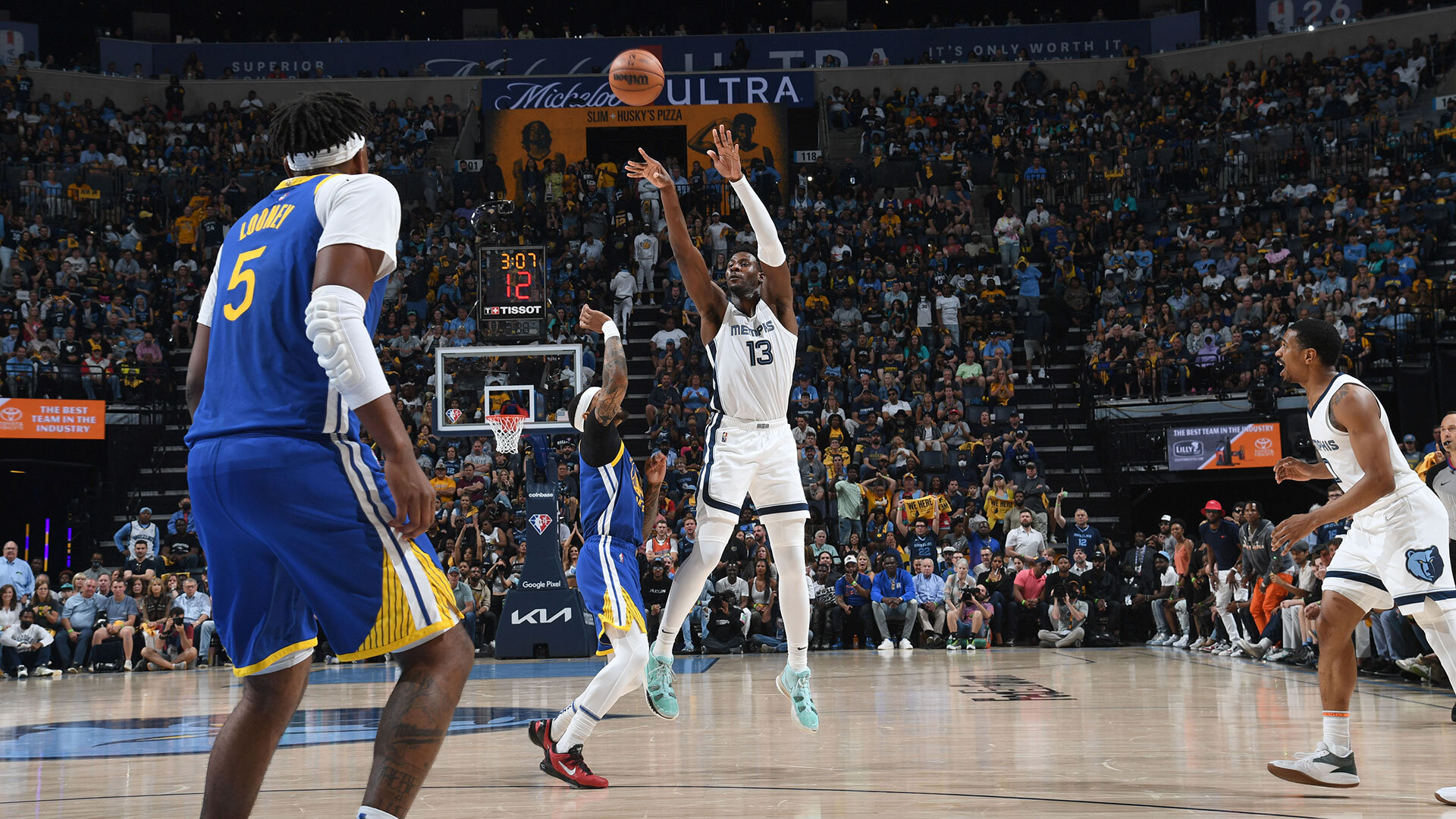 MEMPHIS, TN - MAY 1: Jaren Jackson Jr. #13 of the Memphis Grizzlies shoots a three point basket during the game against the Golden State Warriors during Game 1 of the 2022 NBA Playoffs Western Conference Semifinals on May 1, 2022 at FedExForum in Memphis, Tennessee. Photo by Noah Graham/NBAE via Getty Images