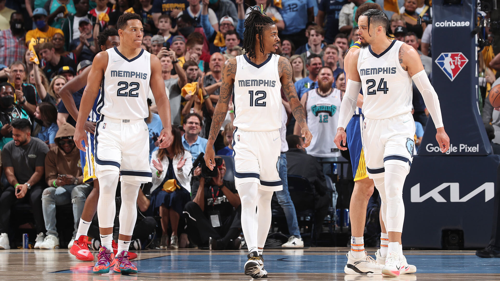 MEMPHIS, TN - MAY 1: Desmond Bane #22, Ja Morant #12 and Dillon Brooks #24 of the Memphis Grizzlies look on during Game 1 of the 2022 NBA Playoffs Western Conference Semifinals on May 1, 2022 at FedExForum in Memphis, Tennessee. Photo by Joe Murphy/NBAE via Getty Images