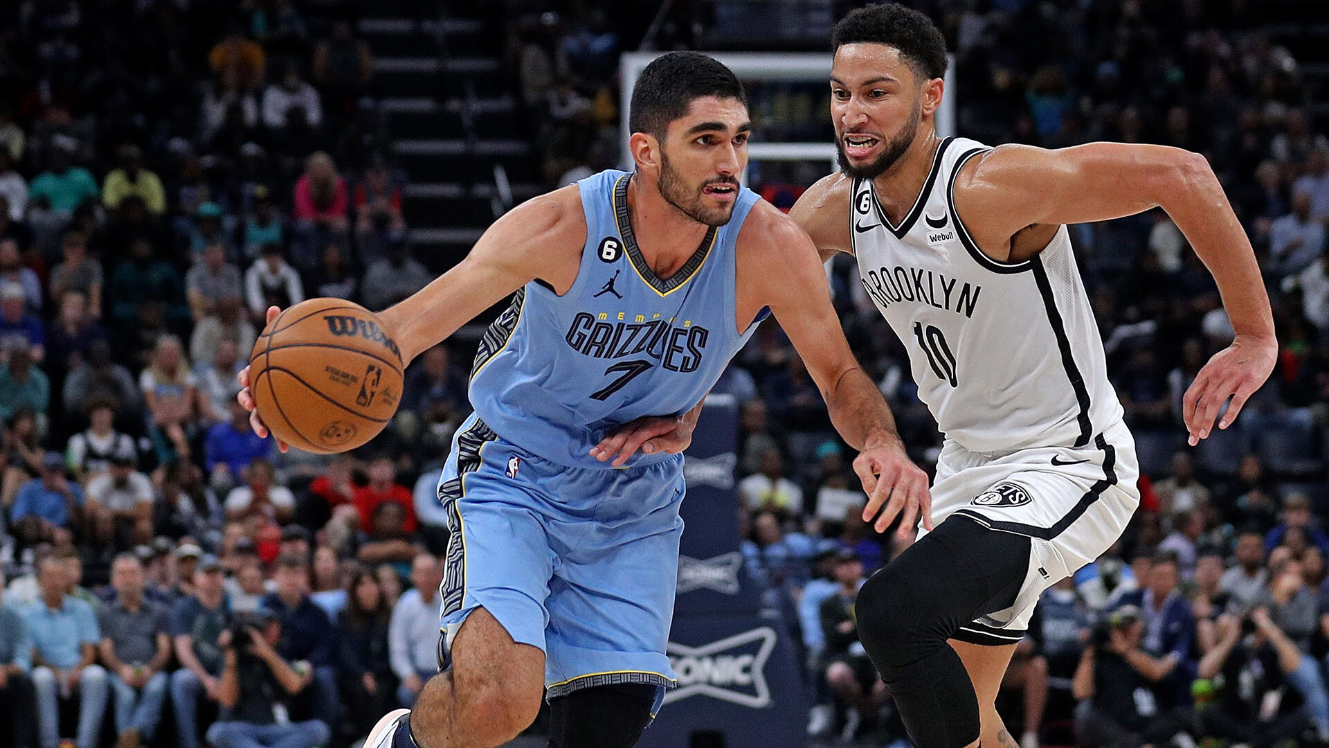 MEMPHIS, TENNESSEE - OCTOBER 24: Santi Aldama #7 of the Memphis Grizzlies goes to the basket against Ben Simmons #10 of the Brooklyn Nets during the game at FedExForum on October 24, 2022 in Memphis, Tennessee. Photo by Justin Ford/Getty Images