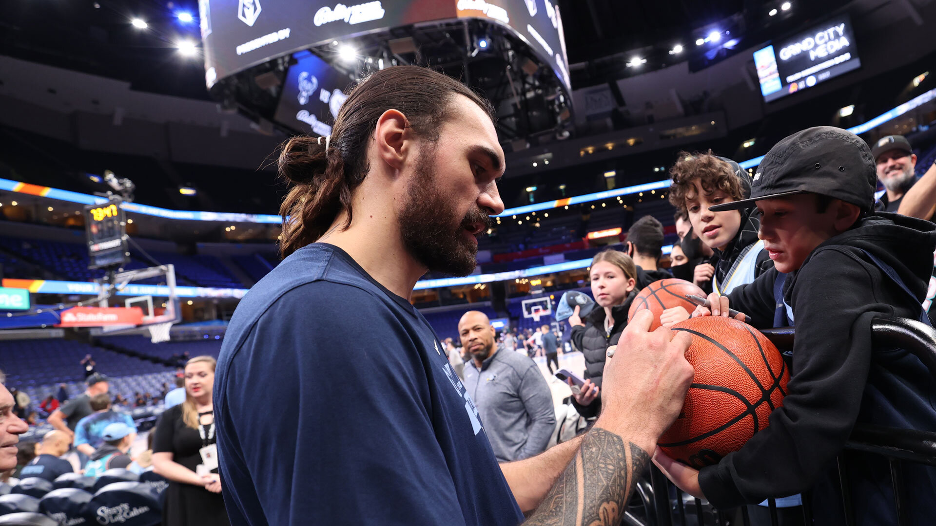 MEMPHIS, TN - DECEMBER 15: Steven Adams #4 of the Memphis Grizzlies engages with fans before the game against the Milwaukee Bucks on December 15, 2022 at FedExForum in Memphis, Tennessee.