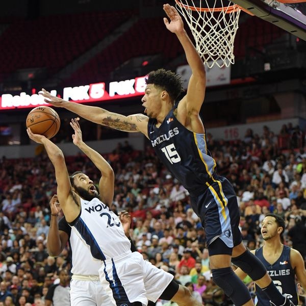 LAS VEGAS, NEVADA - JULY 15: Brandon Clarke #15 of the Memphis Grizzlies blocks a shot by Jordan McLaughlin #26 of the Minnesota Timberwolves during the championship game of the 2019 NBA Summer League at the Thomas & Mack Center on July 15, 2019 in Las Vegas, Nevada.