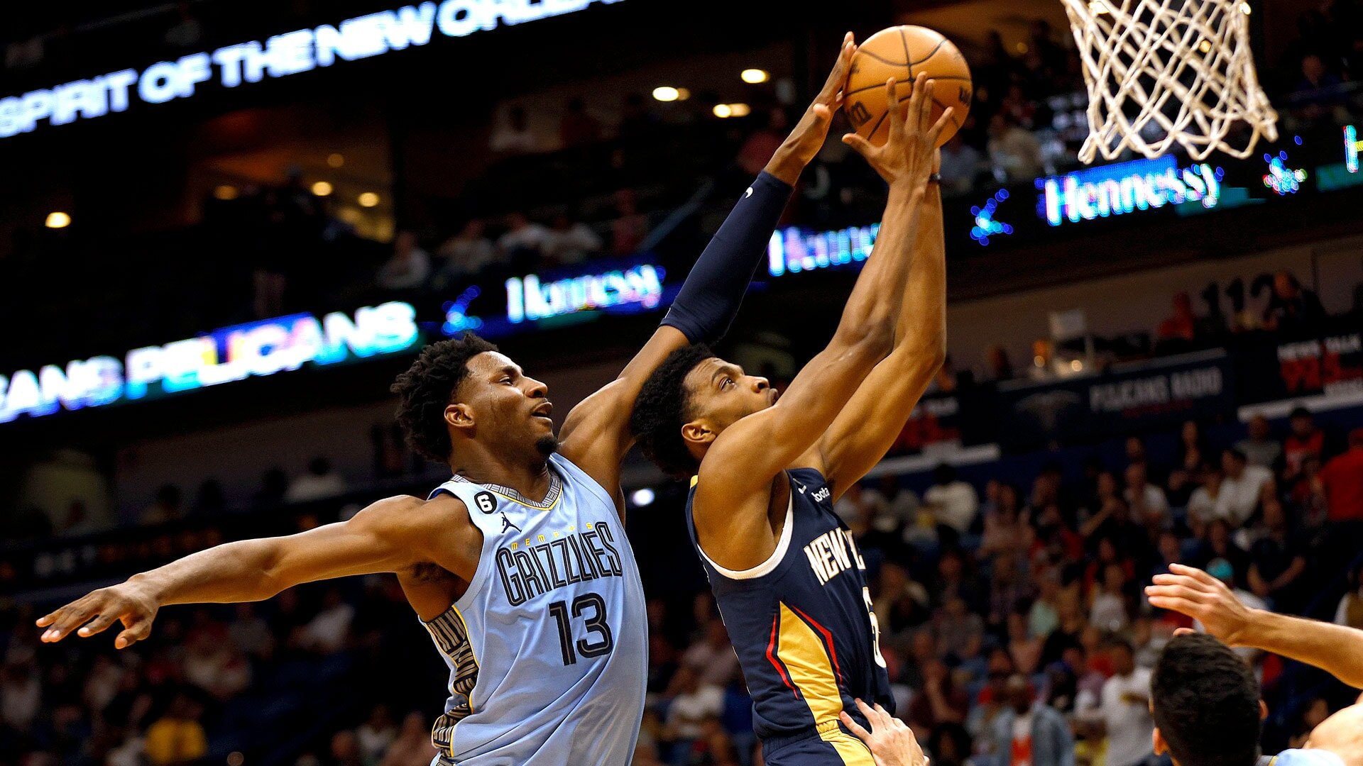 NEW ORLEANS, LOUISIANA - APRIL 05: Jaren Jackson Jr. #13 of the Memphis Grizzlies blocks the shot of Herbert Jones #5 of the New Orleans Pelicans during the first quarter of an NBA game at Smoothie King Center on April 05, 2023 in New Orleans, Louisiana.