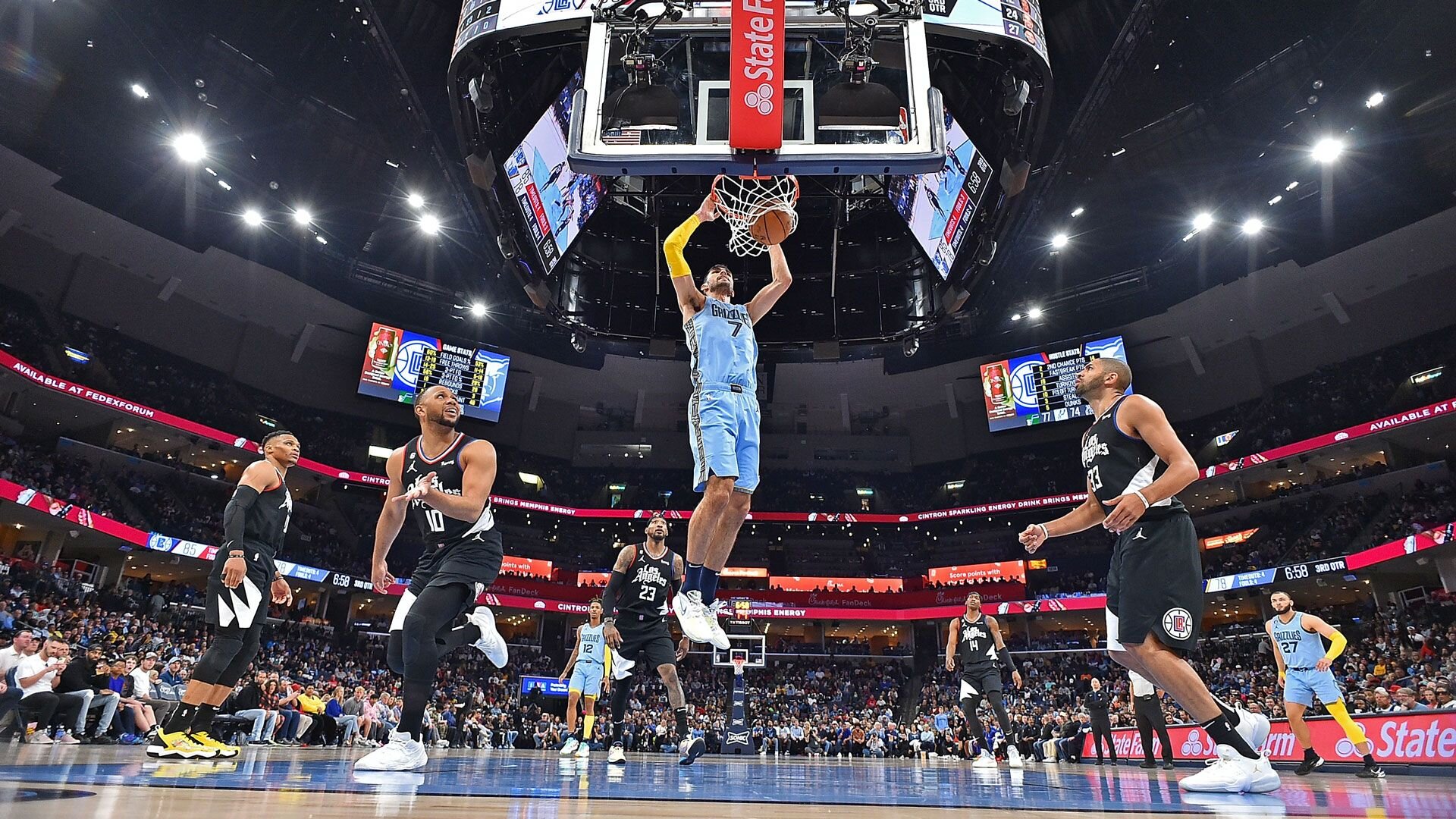 MEMPHIS, TENNESSEE - MARCH 29: Santi Aldama #7 of the Memphis Grizzlies dunks during the game against the LA Clippers at FedExForum on March 29, 2023 in Memphis, Tennessee.