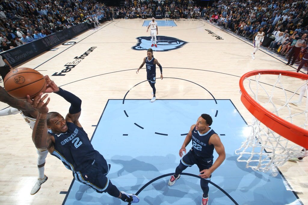 MEMPHIS, TN - APRIL 16: Xavier Tillman #2 of the Memphis Grizzlies rebounds the ball during Round 1 Game 1 of the NBA Playoffs against the Los Angeles Lakers on April 16, 2023 at FedExForum in Memphis, Tennessee. NOTE TO USER: User expressly acknowledges and agrees that, by downloading and or using this photograph, User is consenting to the terms and conditions of the Getty Images License Agreement. Mandatory Copyright Notice: Copyright 2023 NBAE (Photo by Joe Murphy/NBAE via Getty Images)