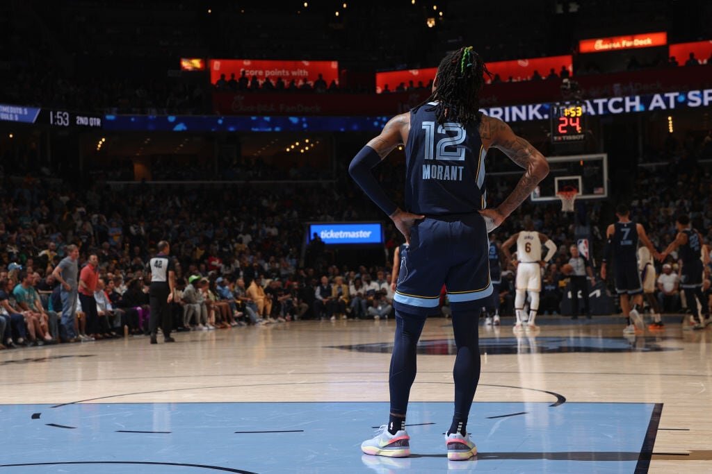 MEMPHIS, TN - APRIL 16: Ja Morant #12 of the Memphis Grizzlies stands on the court against the Los Angeles Lakers during Round 1 Game 1 of the NBA Playoffs on April 16, 2023 at FedExForum in Memphis, Tennessee. NOTE TO USER: User expressly acknowledges and agrees that, by downloading and or using this photograph, User is consenting to the terms and conditions of the Getty Images License Agreement. Mandatory Copyright Notice: Copyright 2023 NBAE (Photo by Joe Murphy/NBAE via Getty Images)