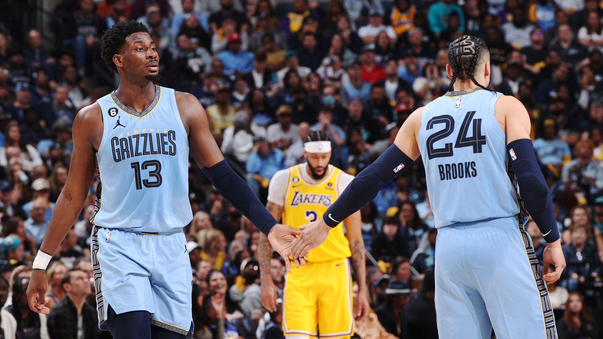 MEMPHIS, TN - APRIL 26: Jaren Jackson Jr. #13 high fives Dillon Brooks #24 of the Memphis Grizzlies during Round 1 Game 5 of the 2023 NBA Playoffs against the Los Angeles Lakers on April 26, 2023 at FedExForum in Memphis, Tennessee.