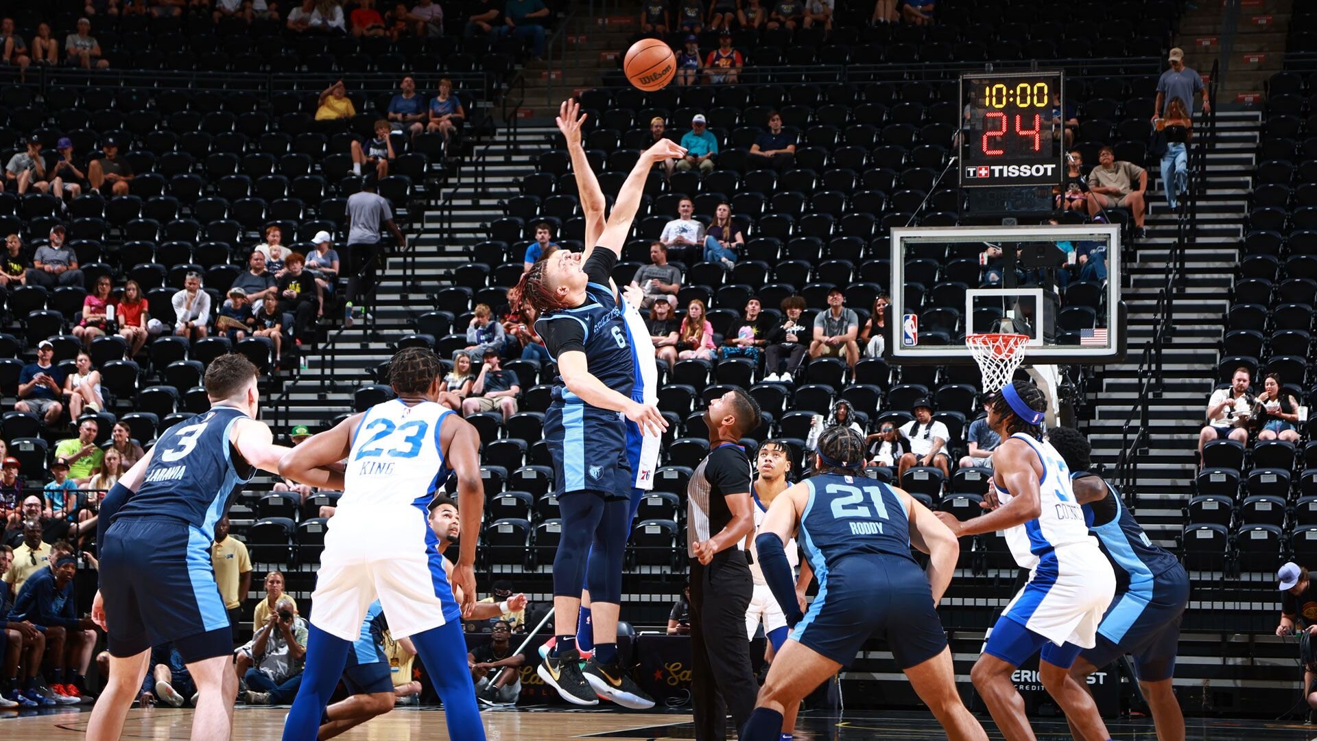 SALT LAKE CITY, UT - JULY 3: Kenny Lofton Jr. #6 of the Memphis Grizzlies jumps for the opening tip off during the game against the Philadelphia 76ers during the 2023 NBA Salt Lake City Summer League on July 3, 2023 at Delta Center in Salt Lake City, Utah.