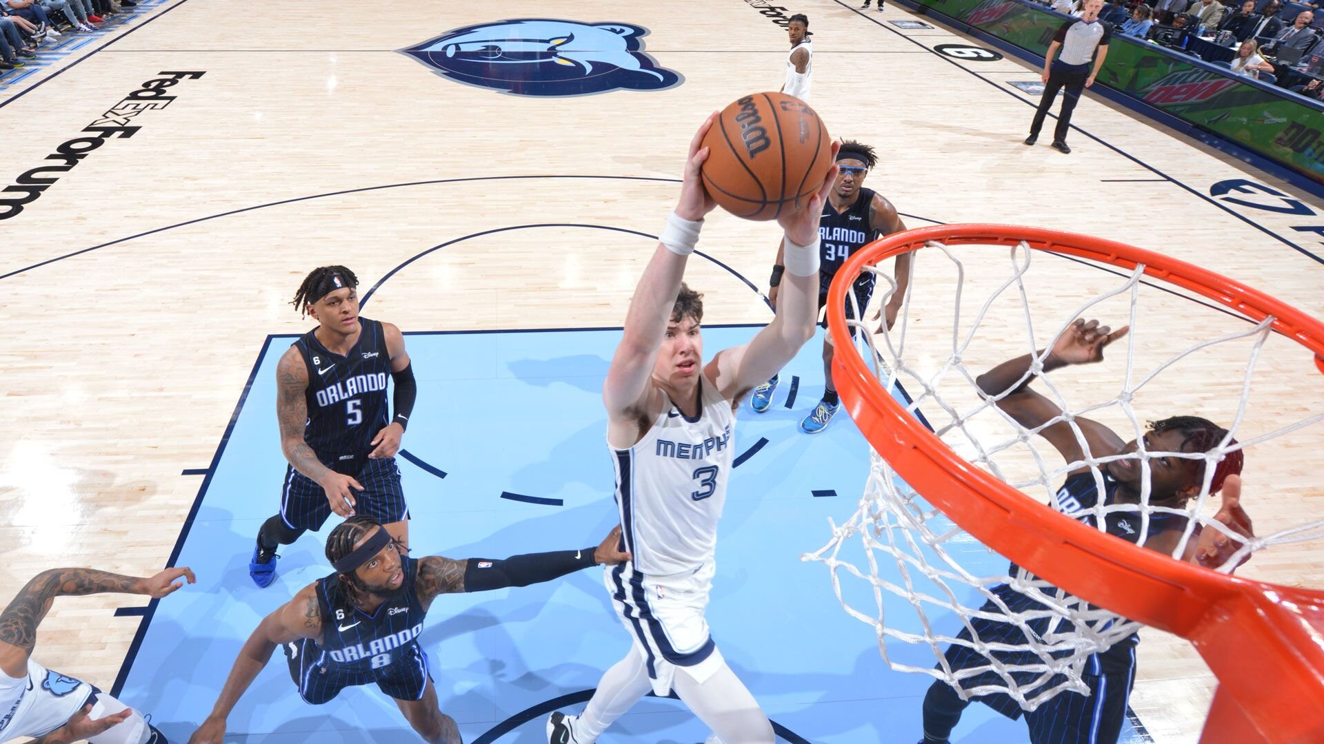 MEMPHIS, TN - OCTOBER 3: Jake LaRavia #3 of the Memphis Grizzlies dunks the ball against the Orlando Magic during a preseason game on October 3, 2022 at FedExForum in Memphis, Tennessee.