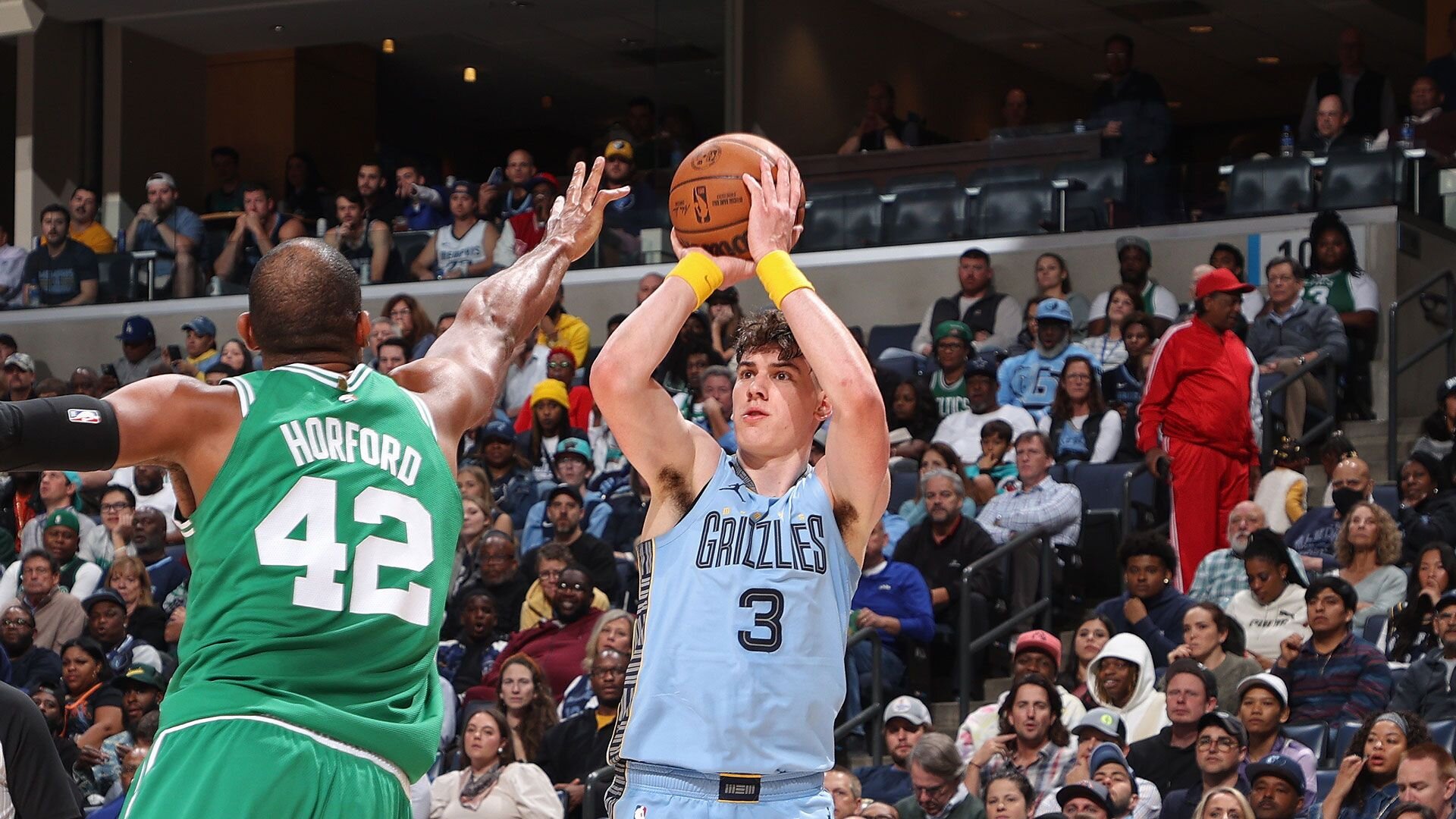 MEMPHIS, TN - NOVEMBER 7: Jake LaRavia #3 of the Memphis Grizzlies shoots a three point basket against the Boston Celtics on November 7, 2022 at FedExForum in Memphis, Tennessee.