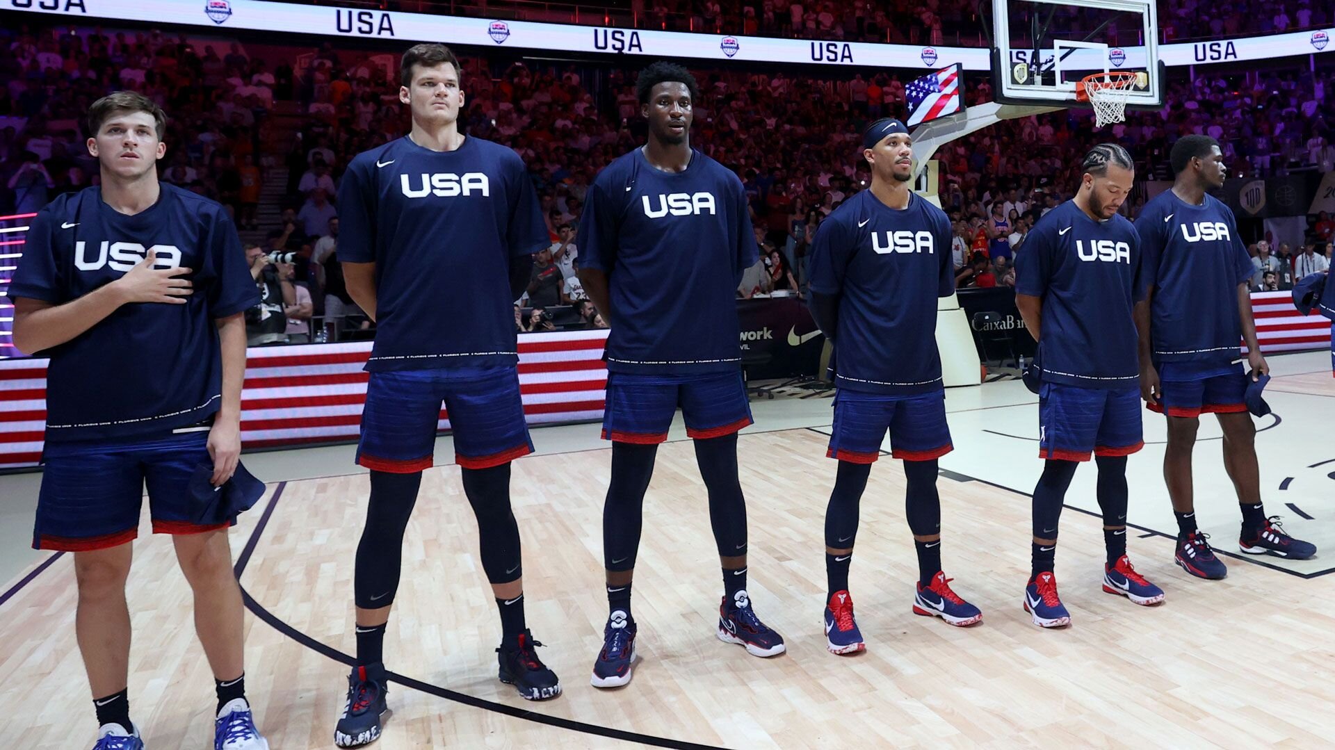 MALAGA, SPAIN - AUGUST 12: The USA Men's National Basketball Team stands for the national anthem before the game against Slovenia on August 12, 2023 at Palacio de Deportes Jose Maria Martin Carpena in Malaga, Spain.