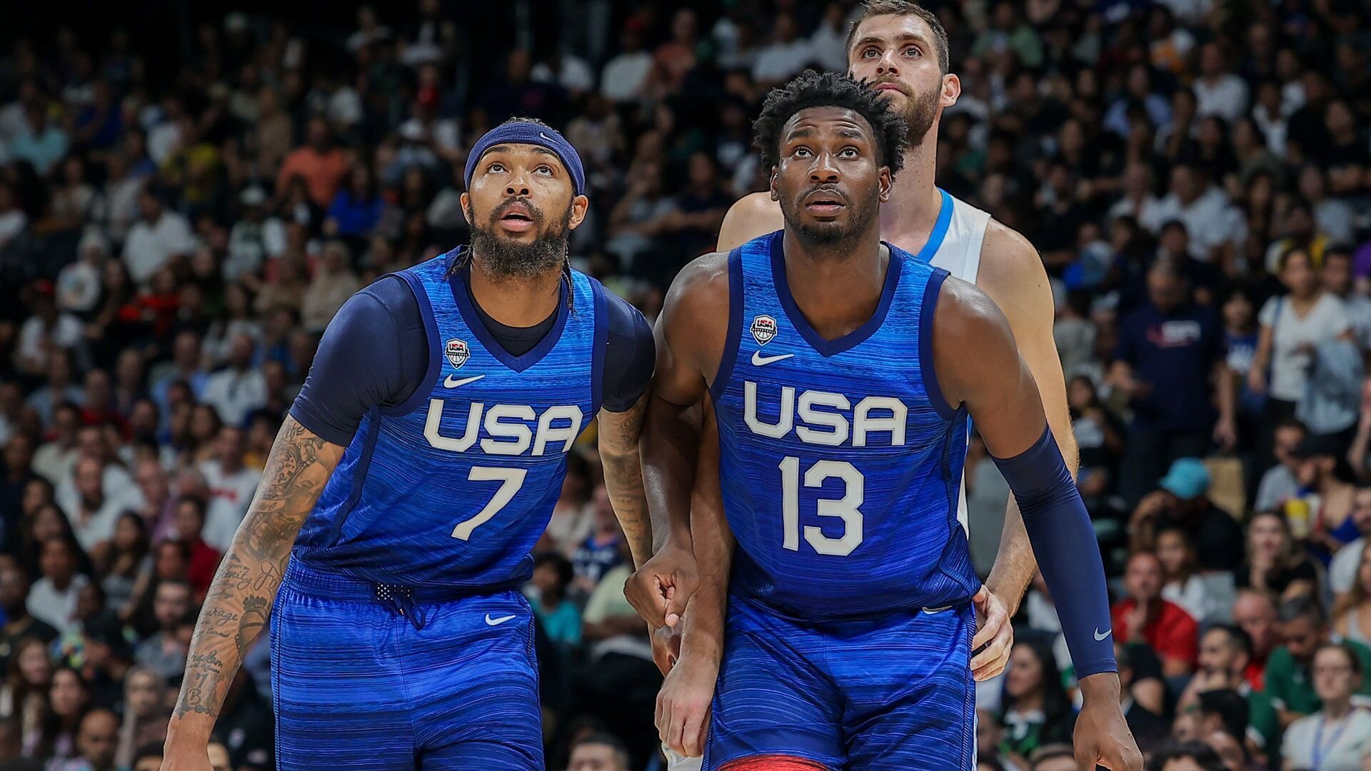 ABU DHABI, UAE - AUGUST 18: Jaren Jackson Jr. (13) and Brandon Ingram (7) of USA in action during a friendly match between USA and Greece as part of 2023 FIBA World Cup at Etihad Arena in Abu Dhabi, The United Arab Emirates on August 18, 2023.