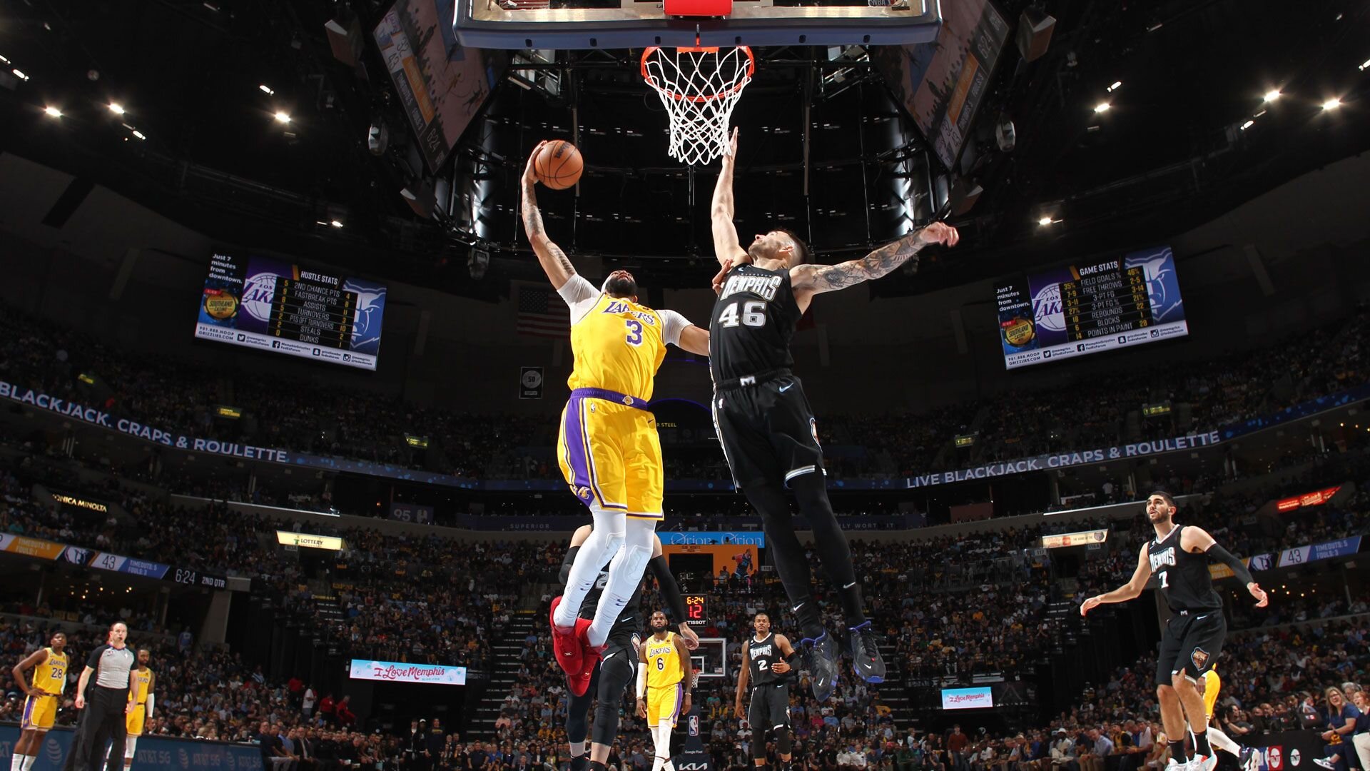 MEMPHIS, TN - APRIL 19: John Konchar #46 of the Memphis Grizzlies goes up to block the shot on Anthony Davis #3 of the Los Angeles Lakers during the game during Round One Game Two of the 2023 NBA Playoffs on April 19, 2023 at FedExForum in Memphis, Tennessee.