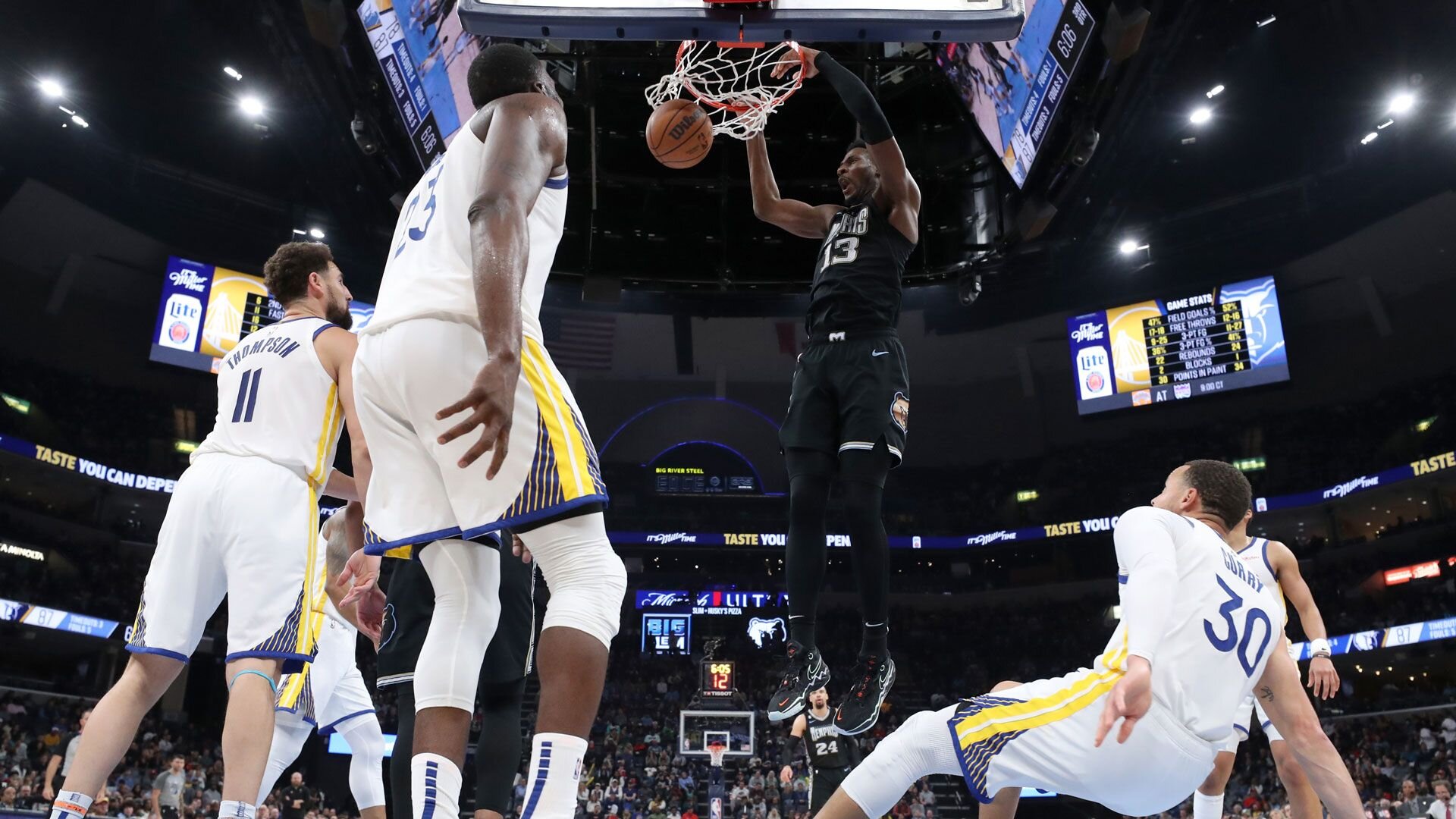 MEMPHIS, TN - MARCH 9: Jaren Jackson Jr. #13 of the Memphis Grizzlies dunks the ball during the game against the Golden State Warriors on March 9, 2023 at FedExForum in Memphis, Tennessee.