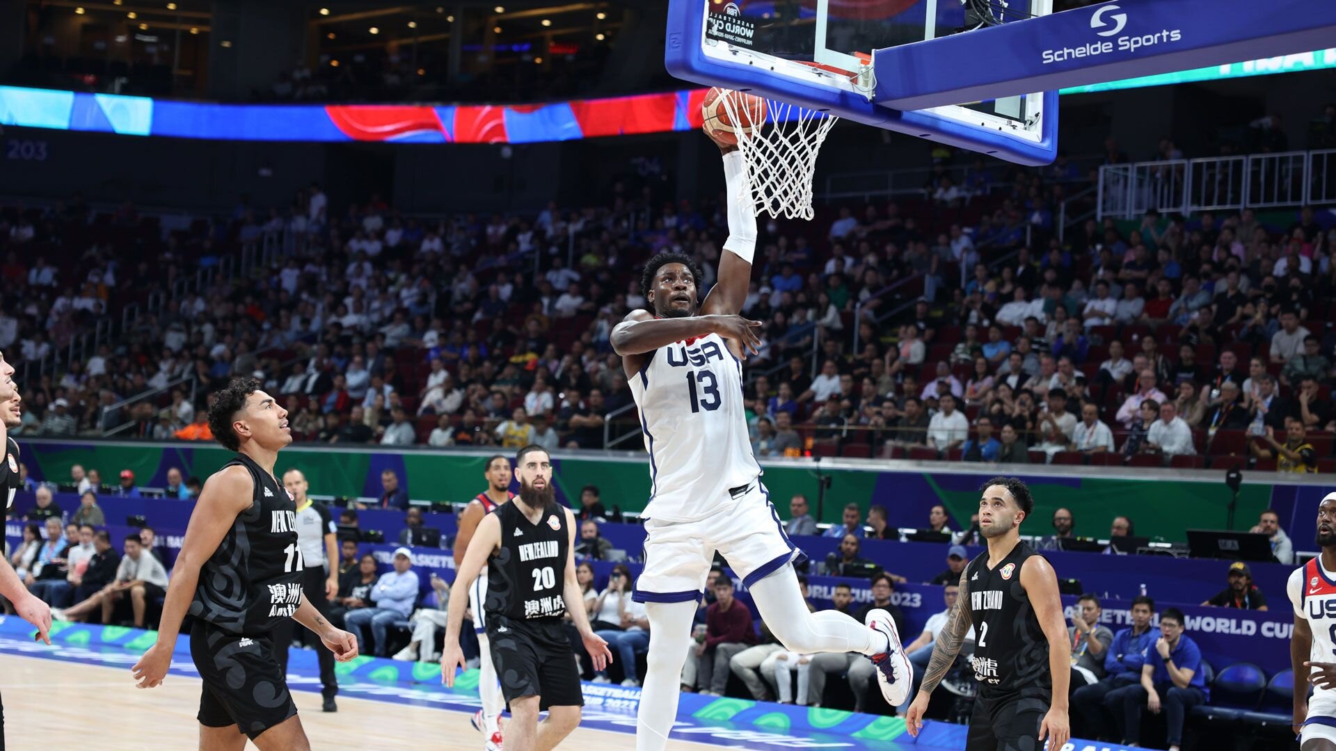 MANILA, PHILIPPINES - AUGUST 26: (Sequence 1 of 4) Jaren Jackson Jr. #13 of the USA Men's Senior National Team dunks against New Zealand as part of the 2023 FIBA World Cup on August 26, 2023 at Mall of Asia Arena in Manila, Philippines.