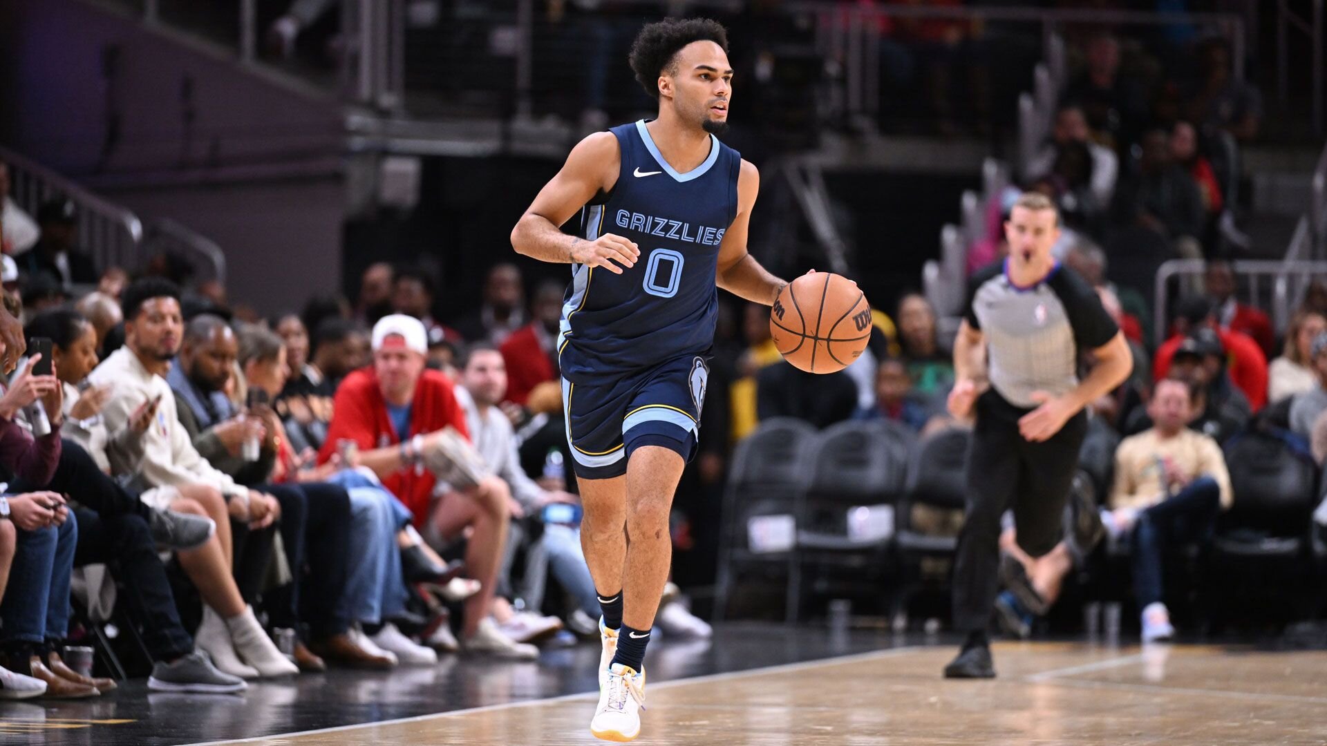 ATLANTA, GA - OCTOBER 12: Jacob Gilyard #0 of the Memphis Grizzlies dribbles the ball during the game against the Atlanta Hawks on October 12, 2023 at State Farm Arena in Atlanta, Georgia.