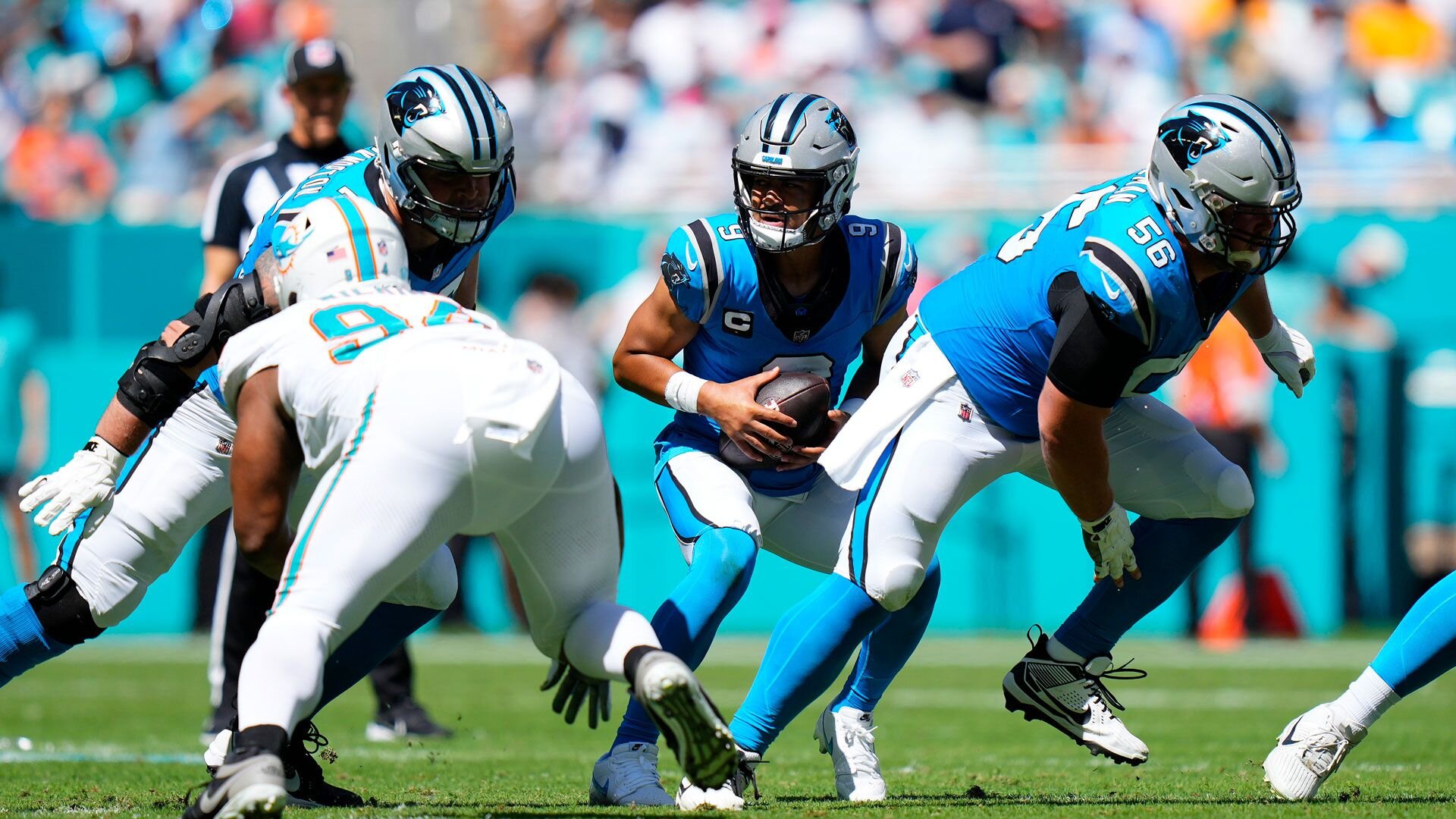 MIAMI GARDENS, FLORIDA - OCTOBER 15: Bryce Young #9 of the Carolina Panthers snaps the ball during the first quarter in the game against the Miami Dolphins at Hard Rock Stadium on October 15, 2023 in Miami Gardens, Florida. (Photo by Rich Storry/Getty Images)