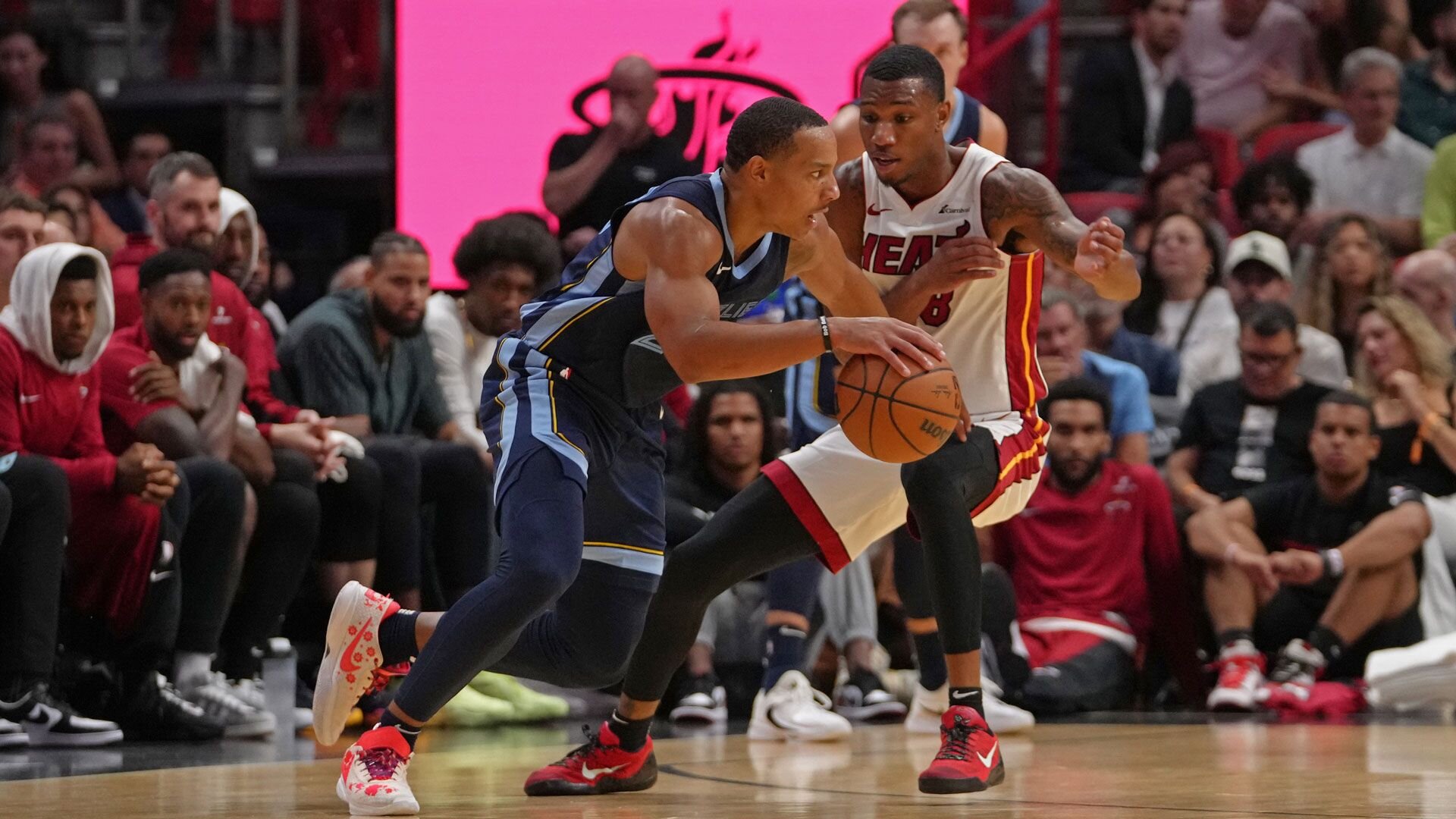 MIAMI, FL - OCTOBER 15: Desmond Bane #22 of the Memphis Grizzlies drives to the basket during the game against the Miami Heat on October 15, 2023 at Kaseya Center in Miami, Florida.