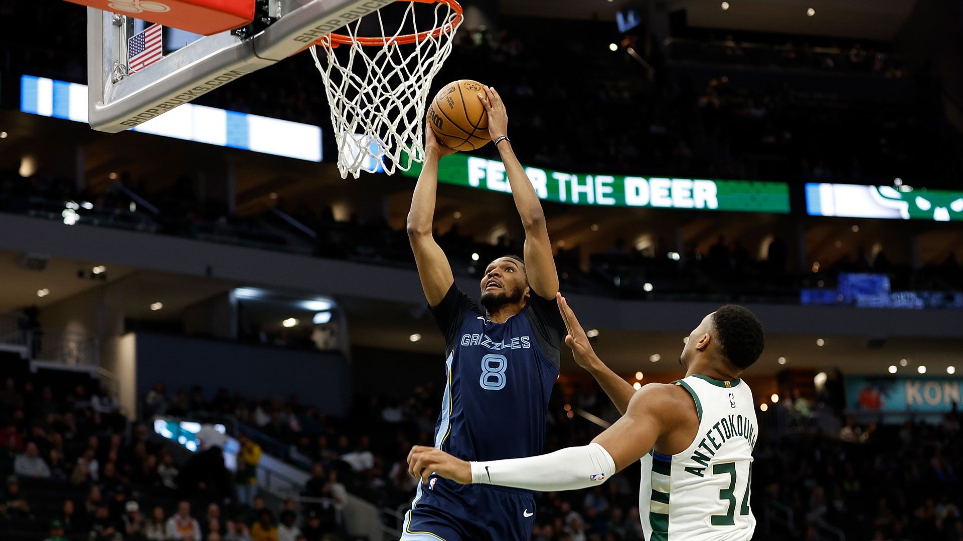 MILWAUKEE, WISCONSIN - OCTOBER 20: Ziaire Williams #8 of the Memphis Grizzlies scores on a dunk during the preseason game against the Milwaukee Bucks at Fiserv Forum on October 20, 2023 in Milwaukee, Wisconsin.