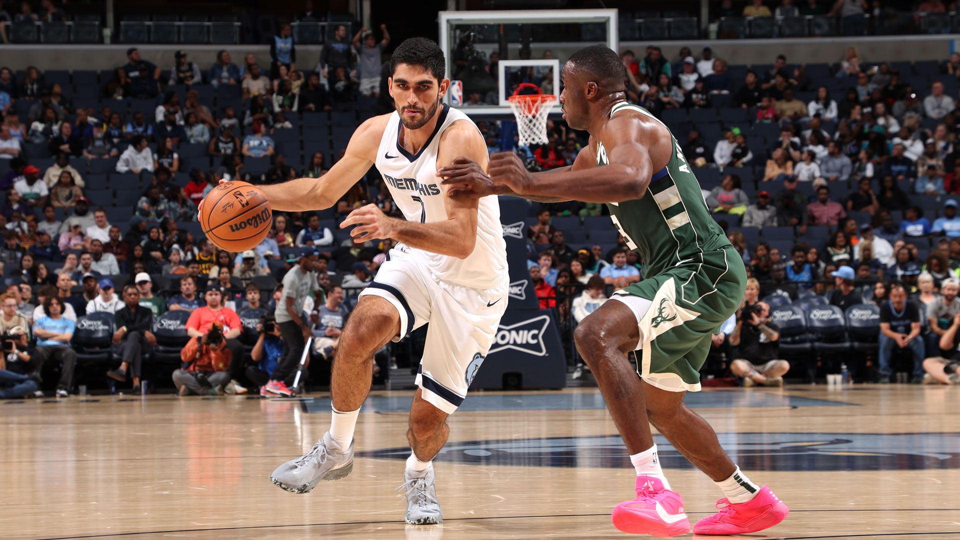 MEMPHIS, TN - OCTOBER 10: Santi Aldama #7 of the Memphis Grizzlies drives to the basket during the game against the Milwaukee Bucks on October 10, 2023 at FedExForum in Memphis, Tennessee.