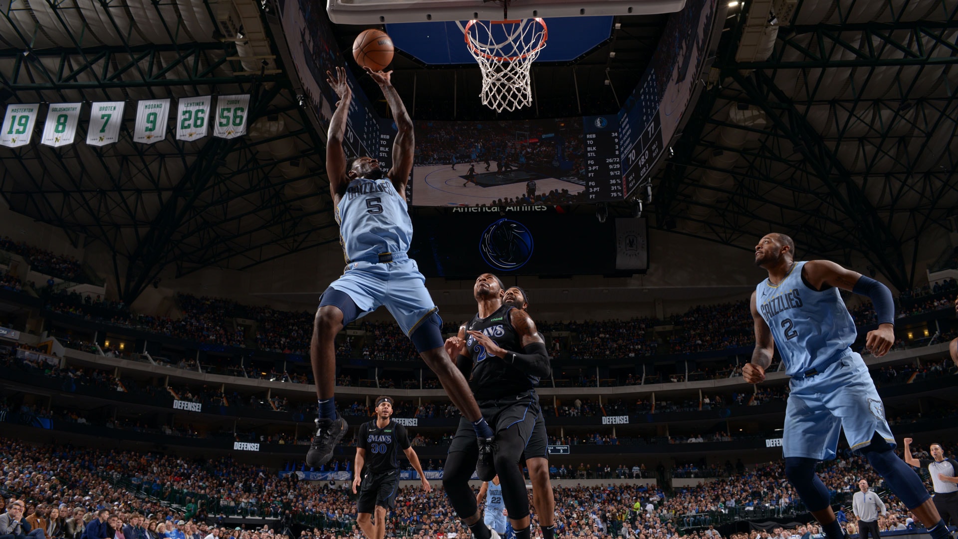 gDALLAS, TX - DECEMBER 1: Vince Williams Jr. #5 of the Memphis Grizzlies drives to the basket during the game against the Dallas Mavericks on December 1, 2023 at the American Airlines Center in Dallas, Texas.
