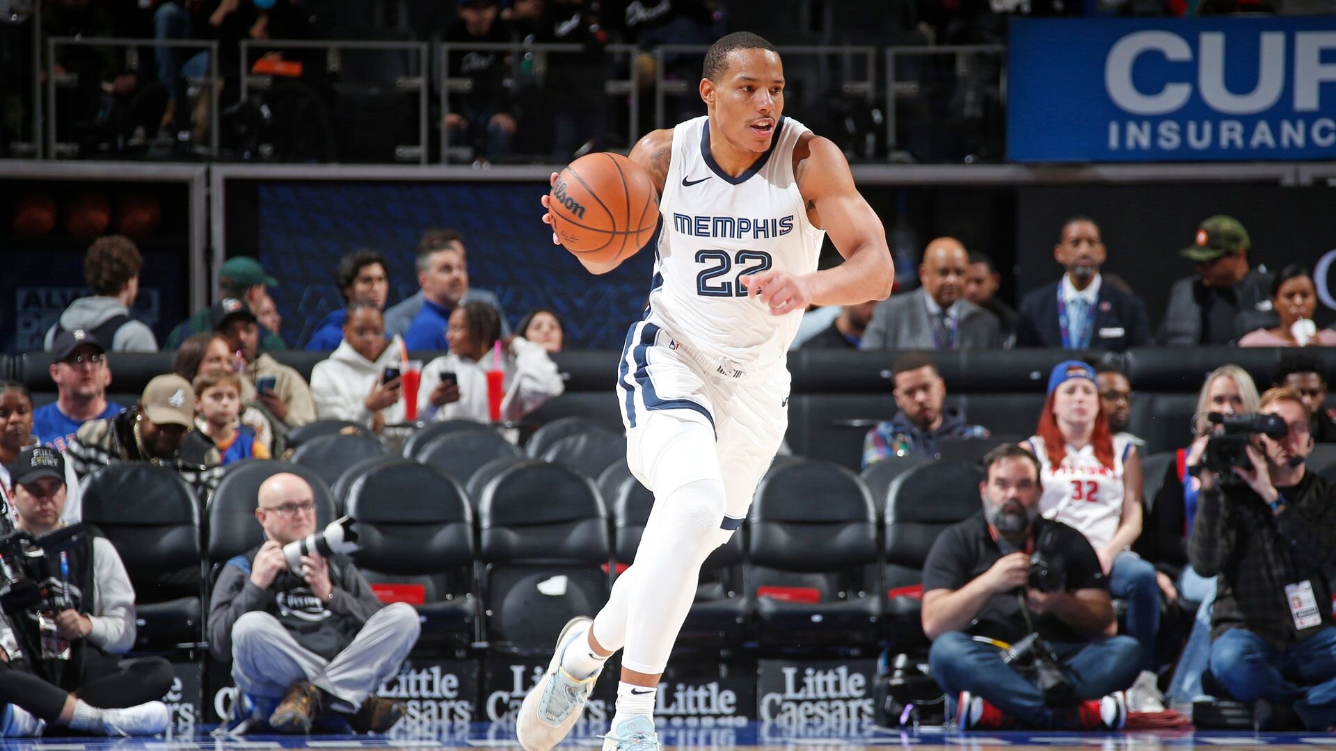 DETROIT, MI - DECEMBER 6: Desmond Bane #22 of the Memphis Grizzlies dribbles the ball during the game against the Detroit Pistons on December 6, 2023 at Little Caesars Arena in Detroit, Michigan.