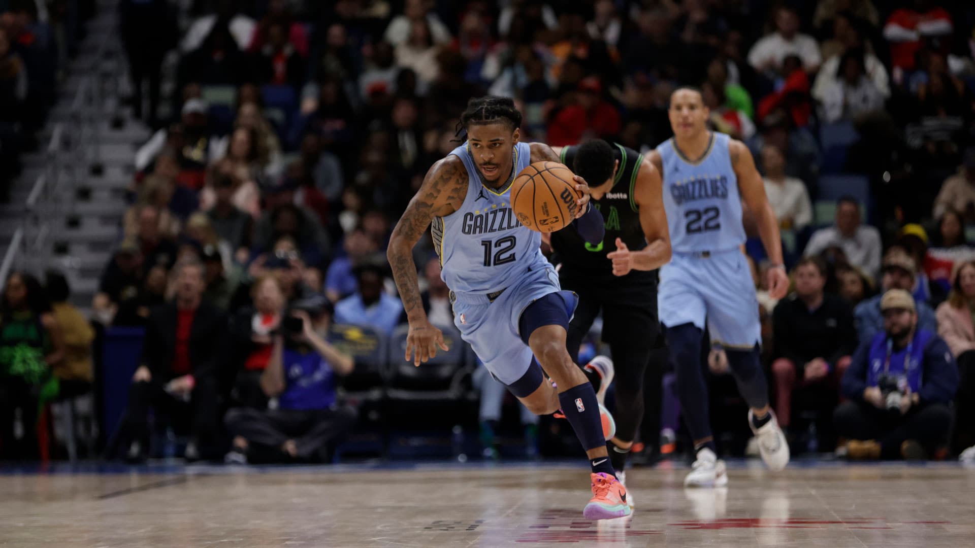 NEW ORLEANS, LA - DECEMBER 26: Ja Morant #12 of the Memphis Grizzlies dribbles the ball during the game against the New Orleans Pelicans on December 26, 2023 at the Smoothie King Center in New Orleans, Louisiana.