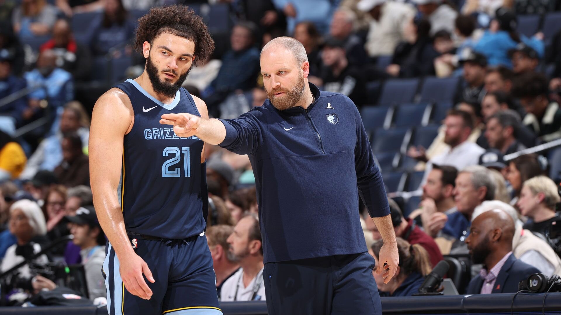 MEMPHIS, TN - JANUARY 29:  Head Coach Taylor Jenkins of the Memphis Grizzlies talk to David Roddy #21 on January 29, 2024 at FedExForum in Memphis, Tennessee.